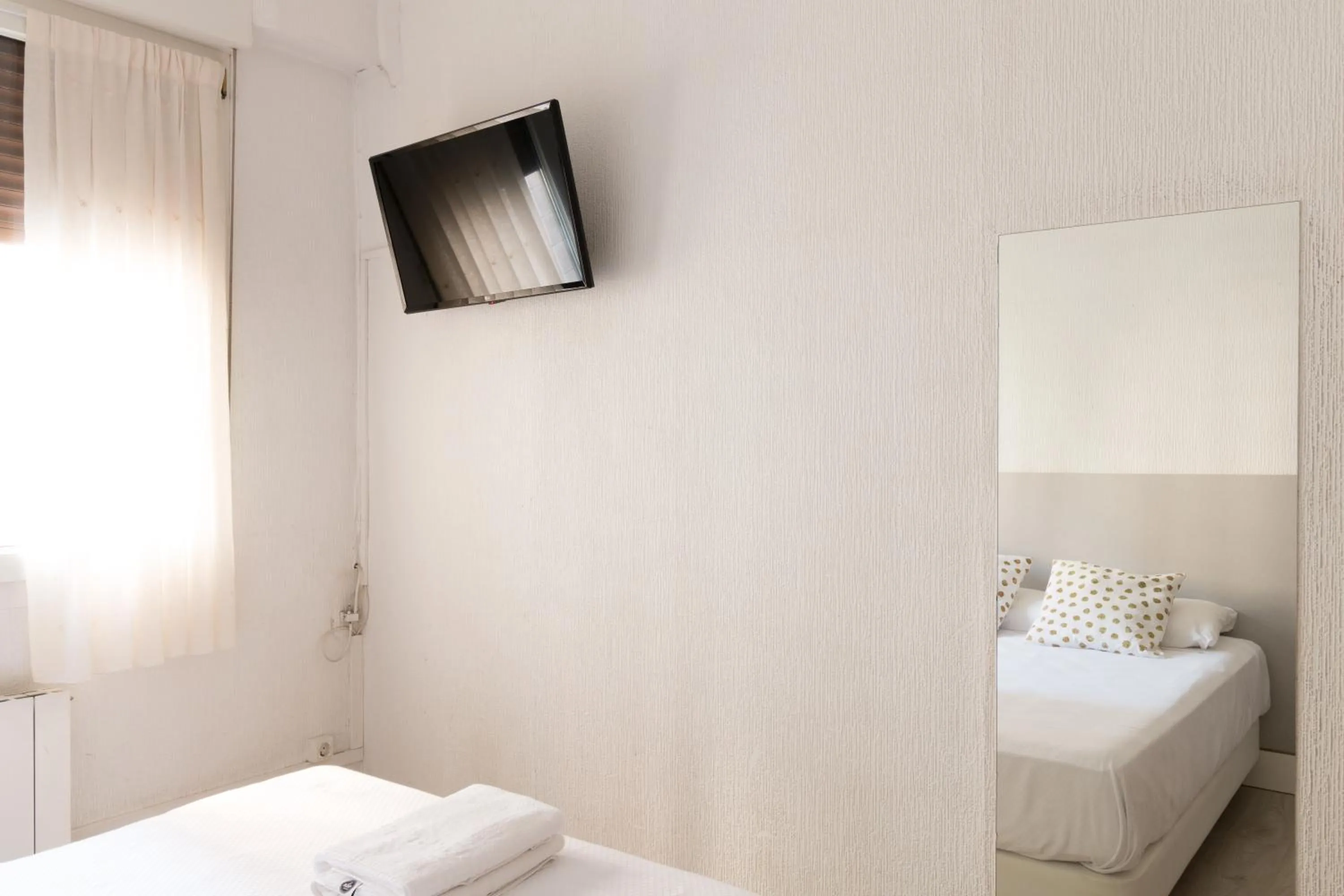 Bed in Pensión Arias