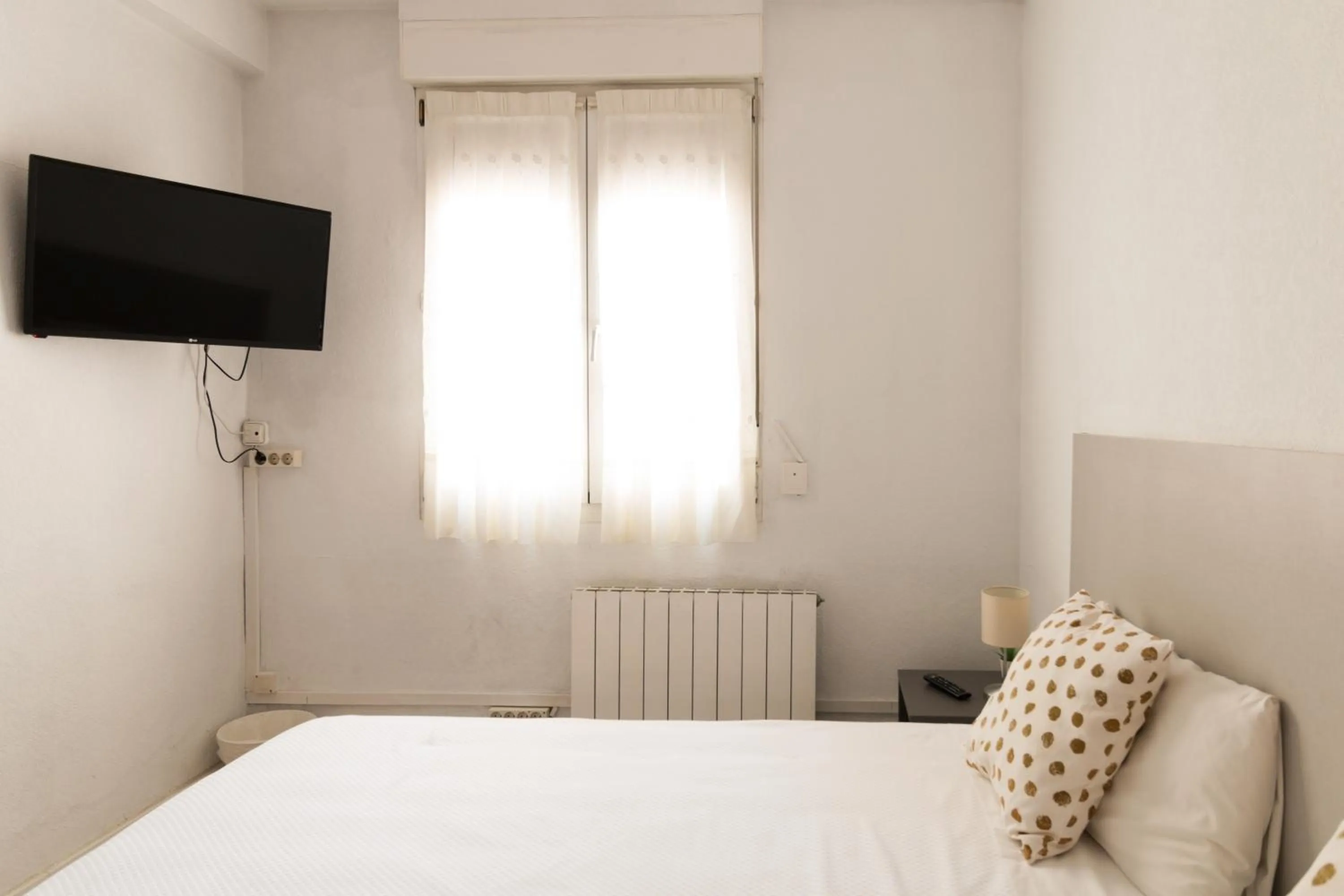 Bed in Pensión Arias