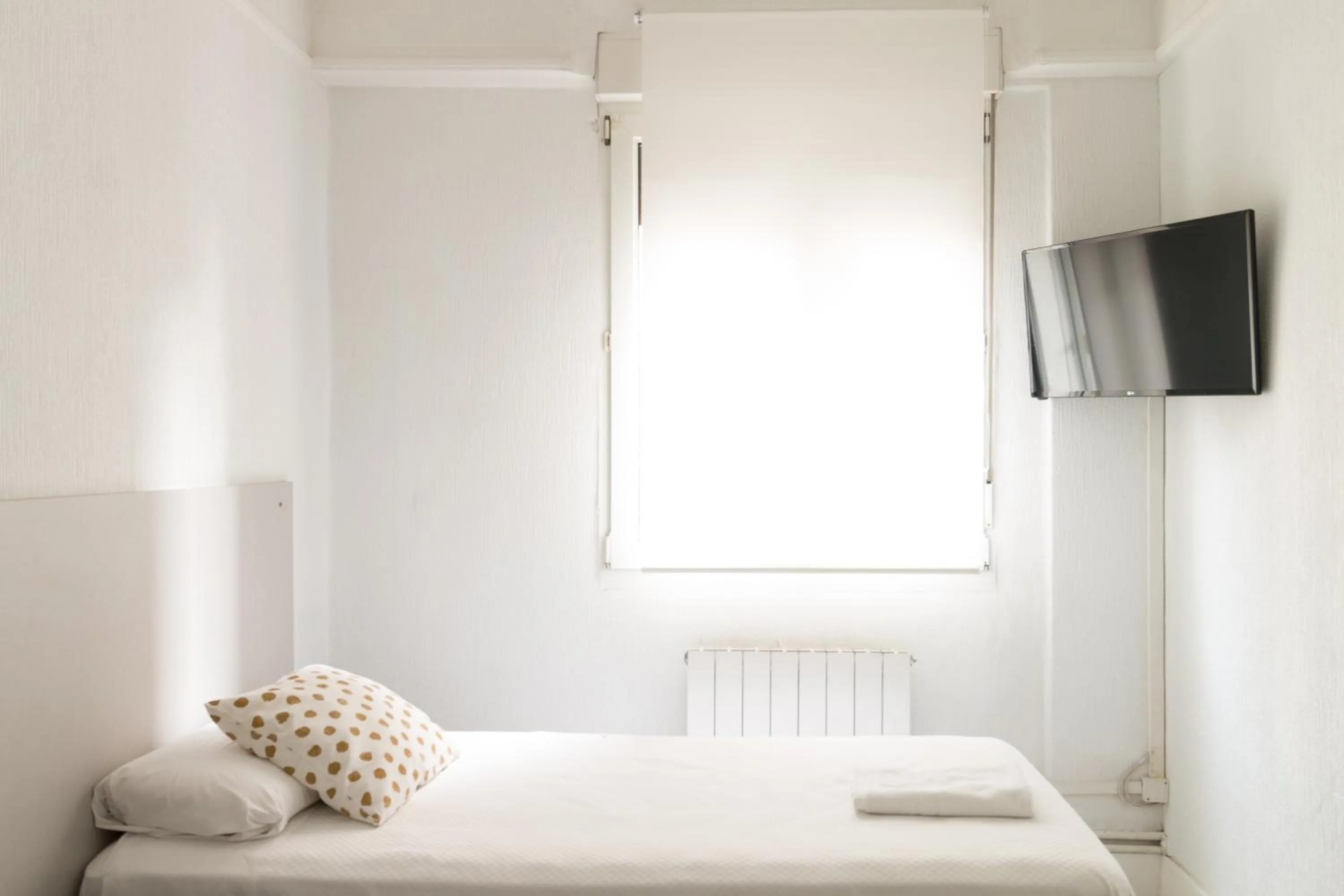 Bed in Pensión Arias