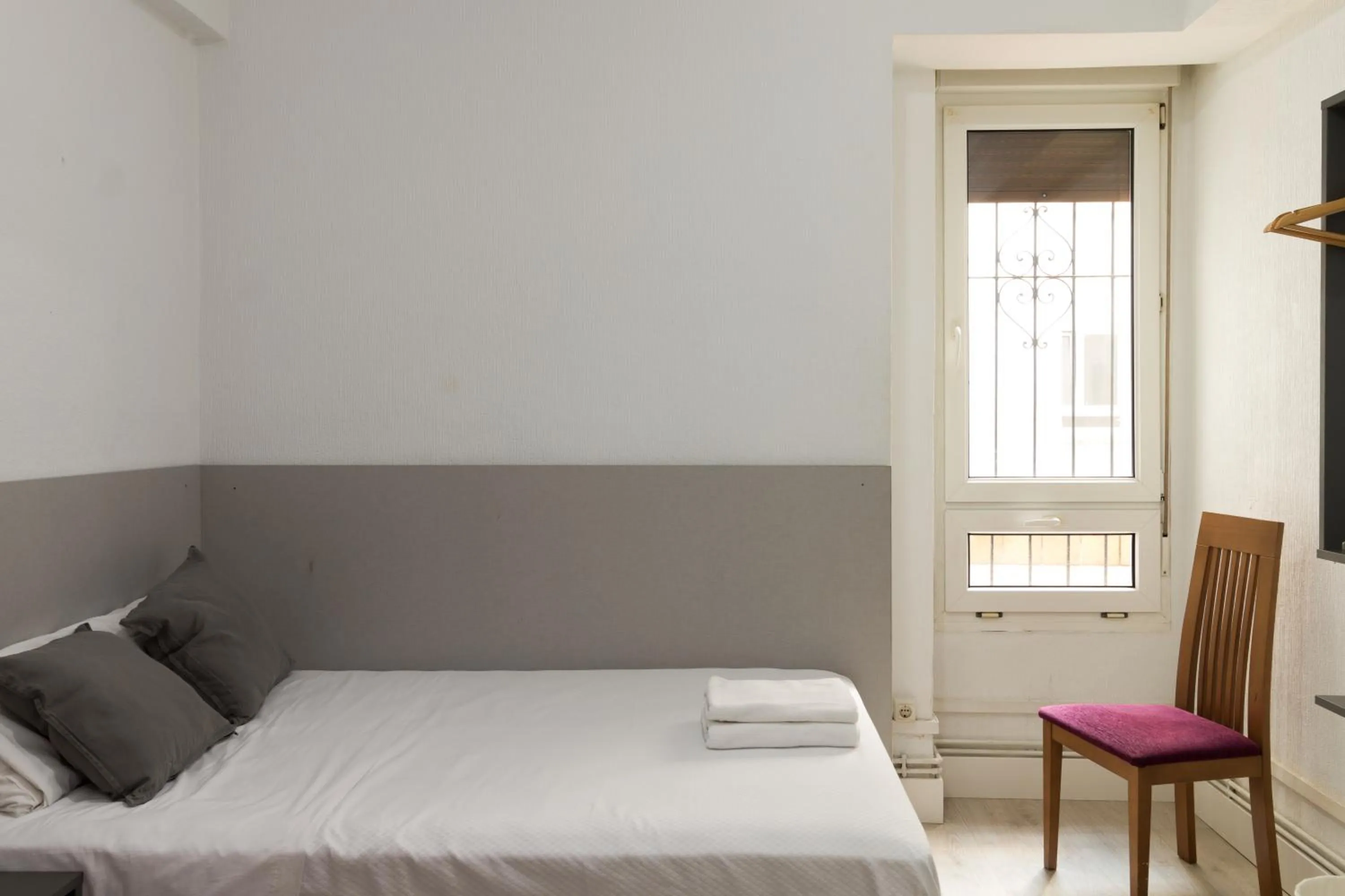 Bed in Pensión Arias