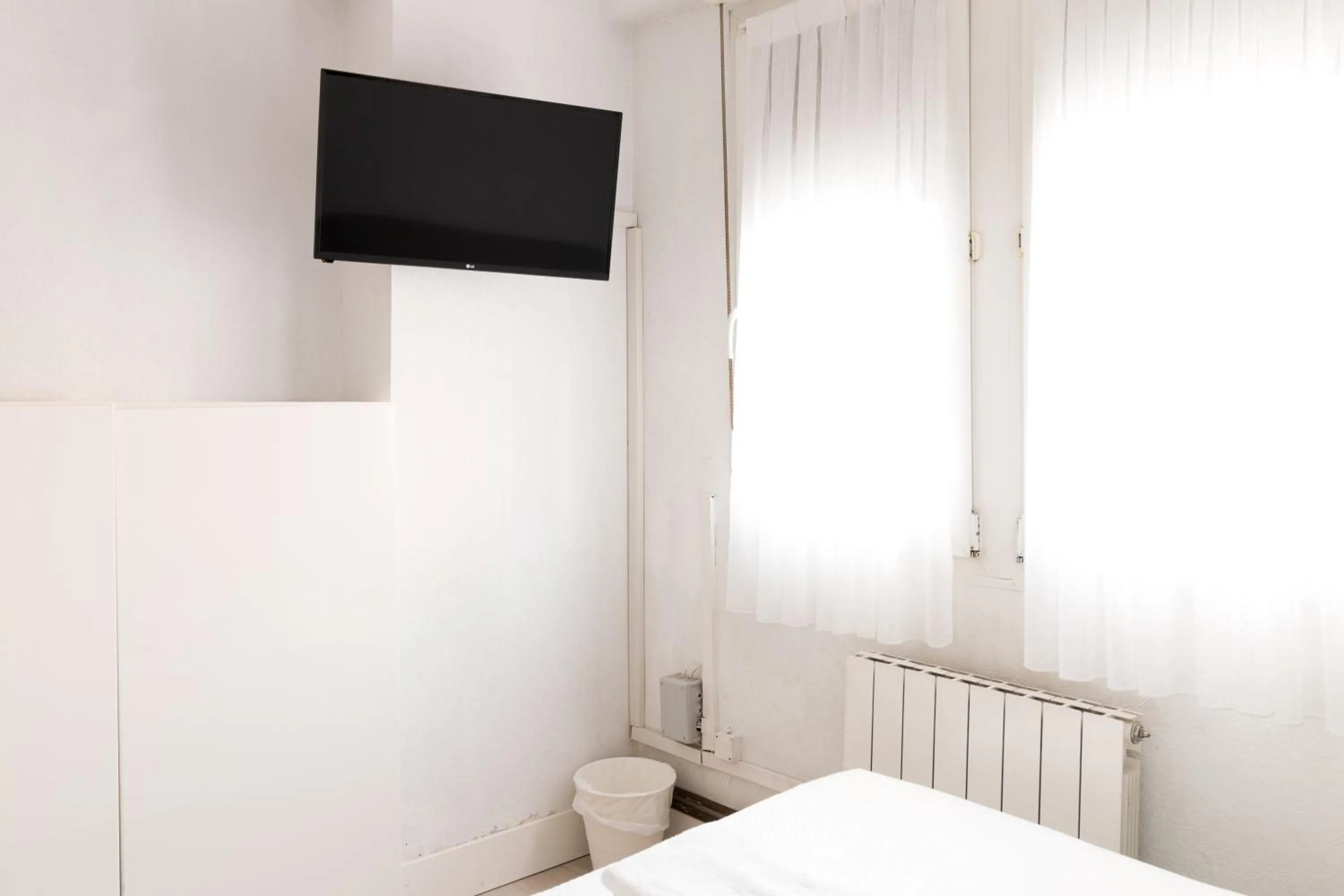 Bed in Pensión Arias