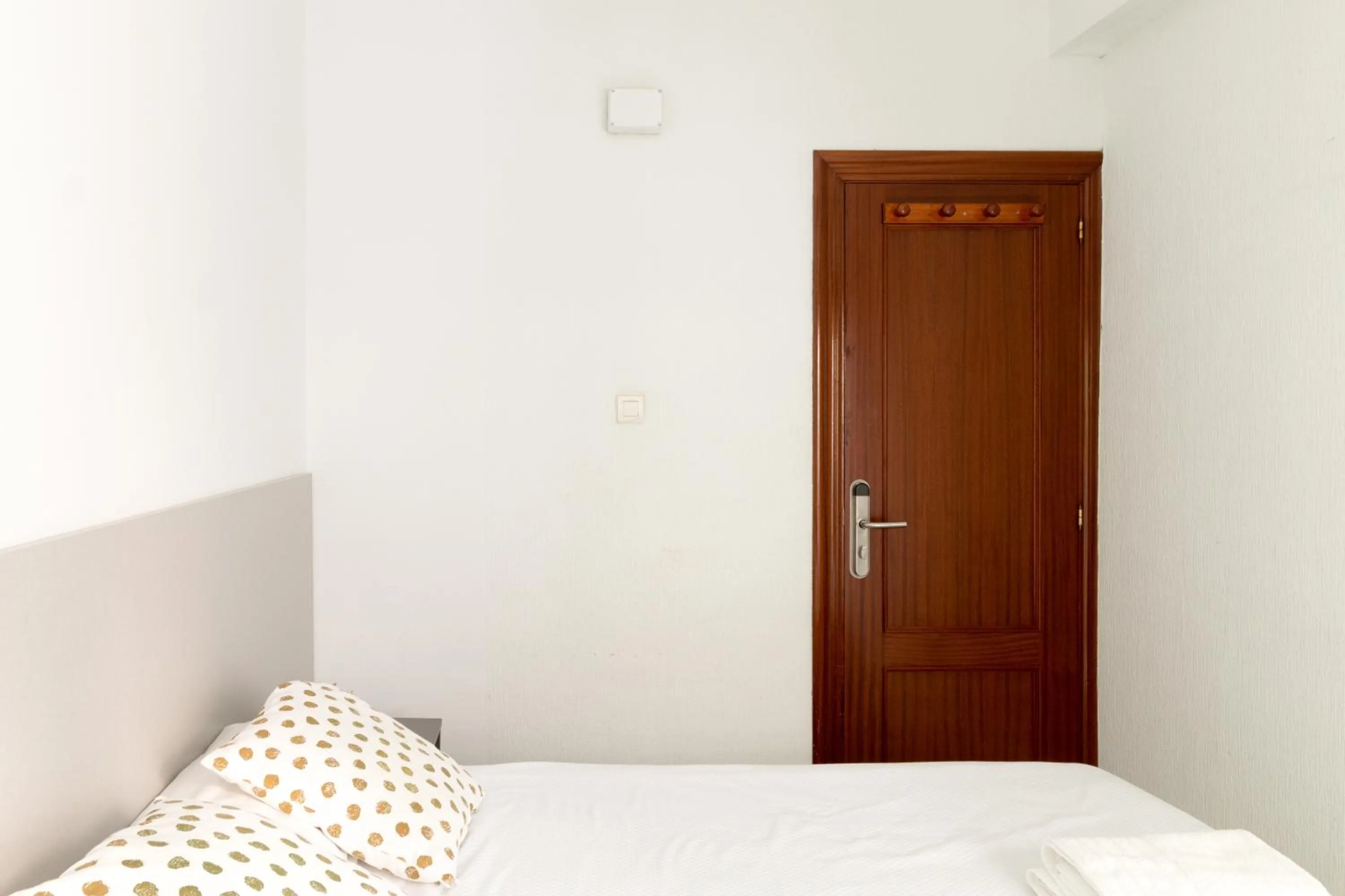 Bed in Pensión Arias