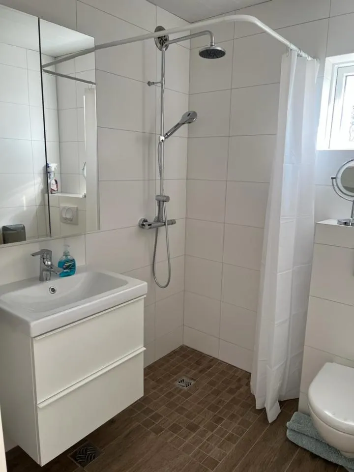 Shower in Lækjarkot Rooms and Cottages with Kitchen