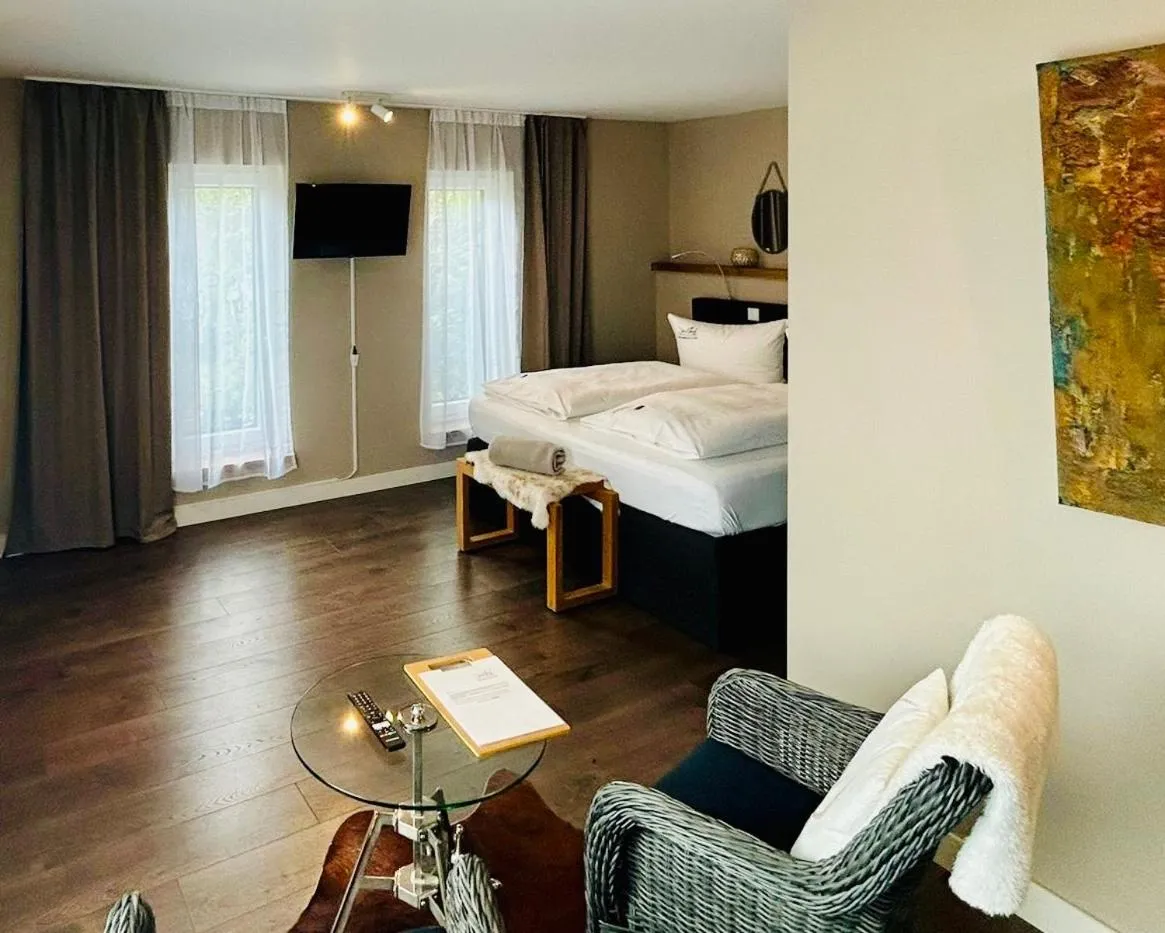 Seating area, Bed in Hotel Inselhof