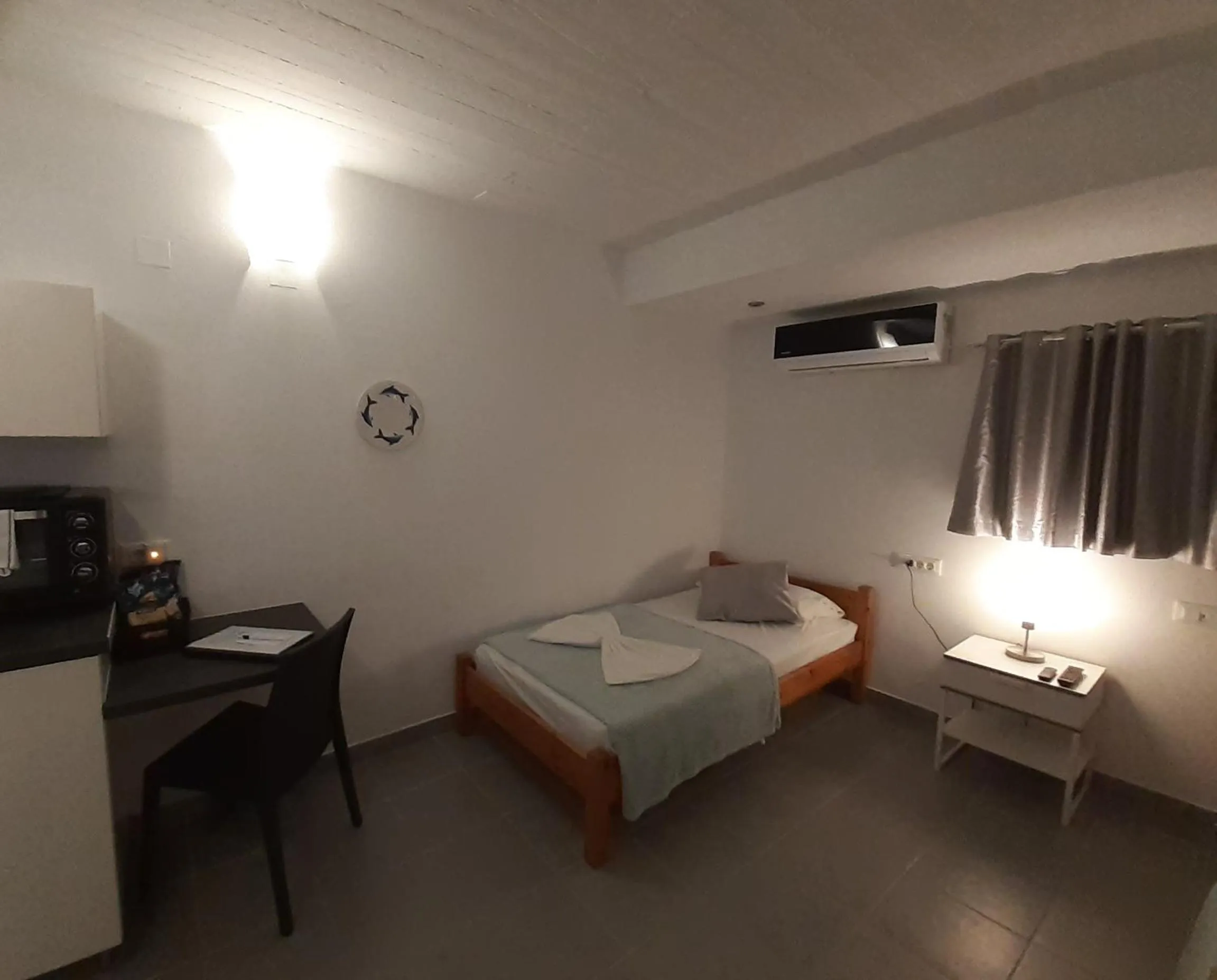 Bedroom, Bed in Delphini Studios - for the disabled