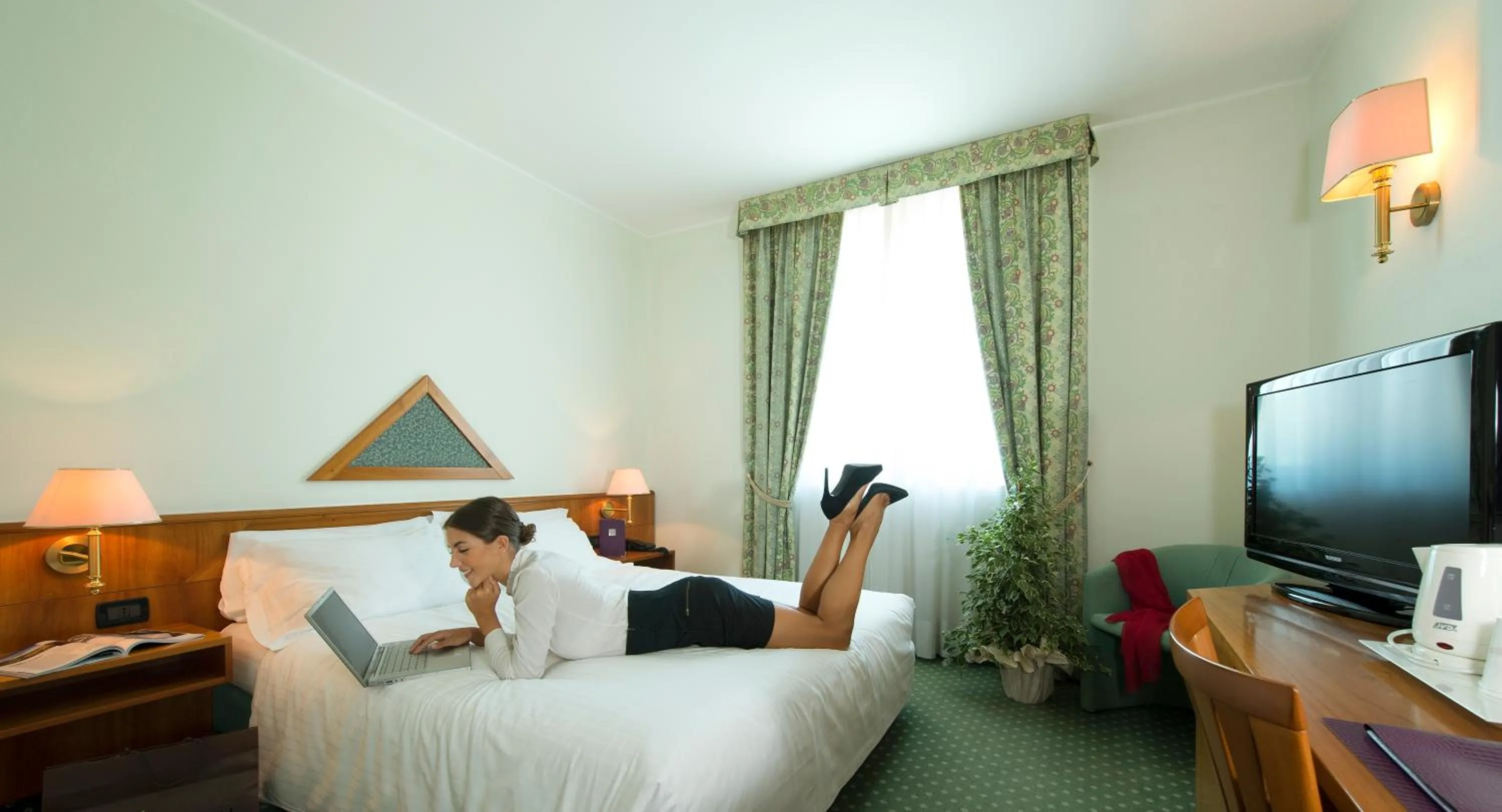 Bed in Castagna Palace Hotel & Restaurant