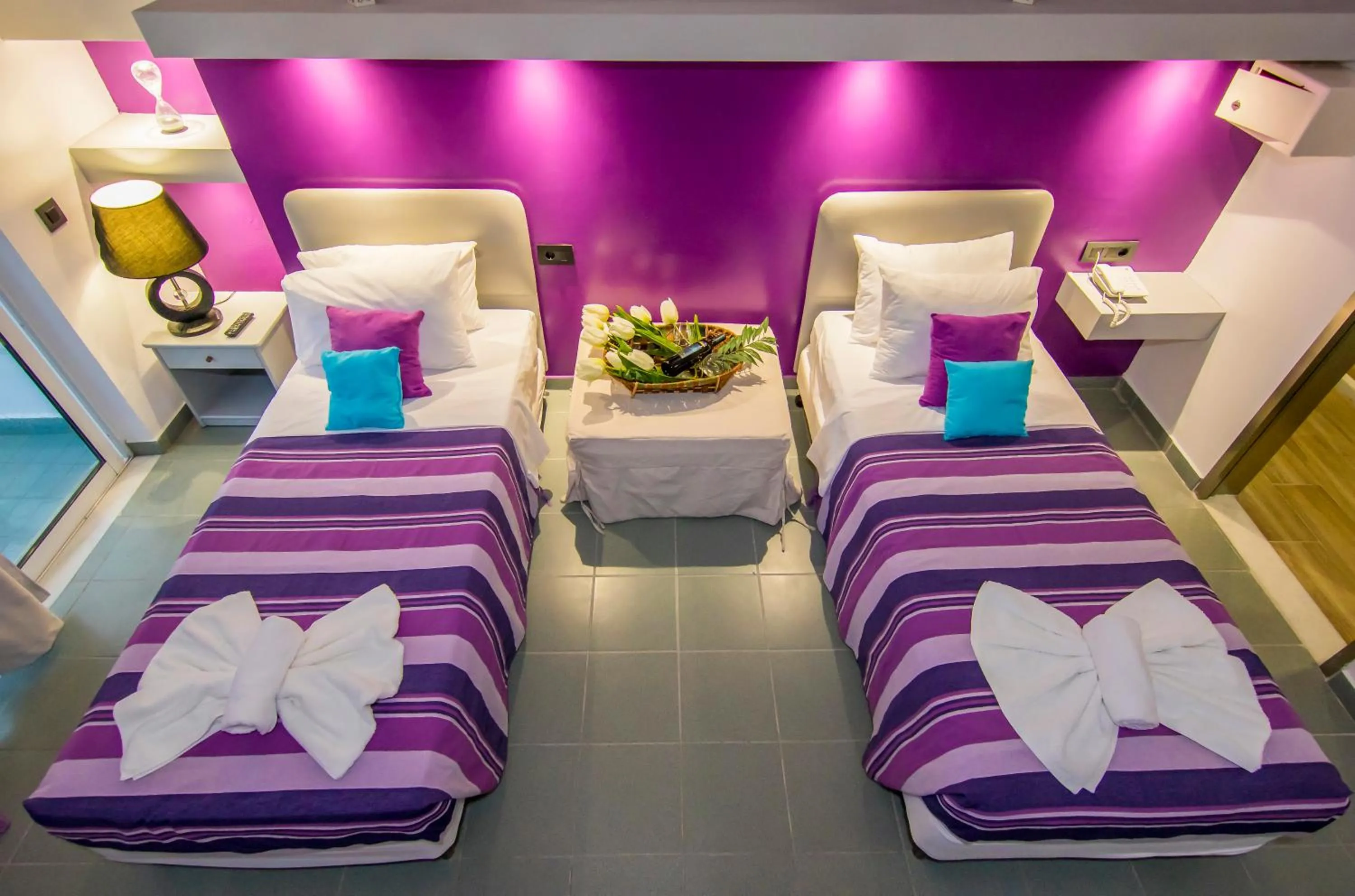 Bed in Kahlua Hotel Apartments