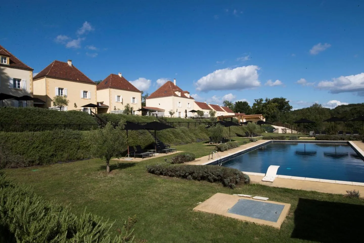 Swimming pool in Château Les Merles et ses Villas