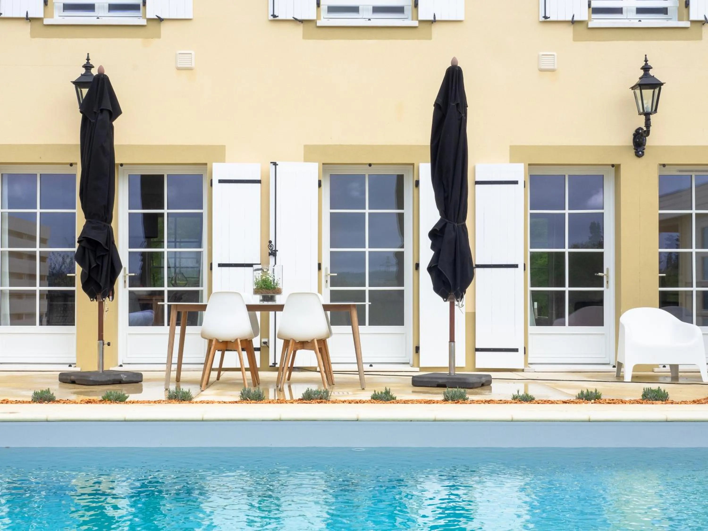 Swimming pool in Château Les Merles et ses Villas