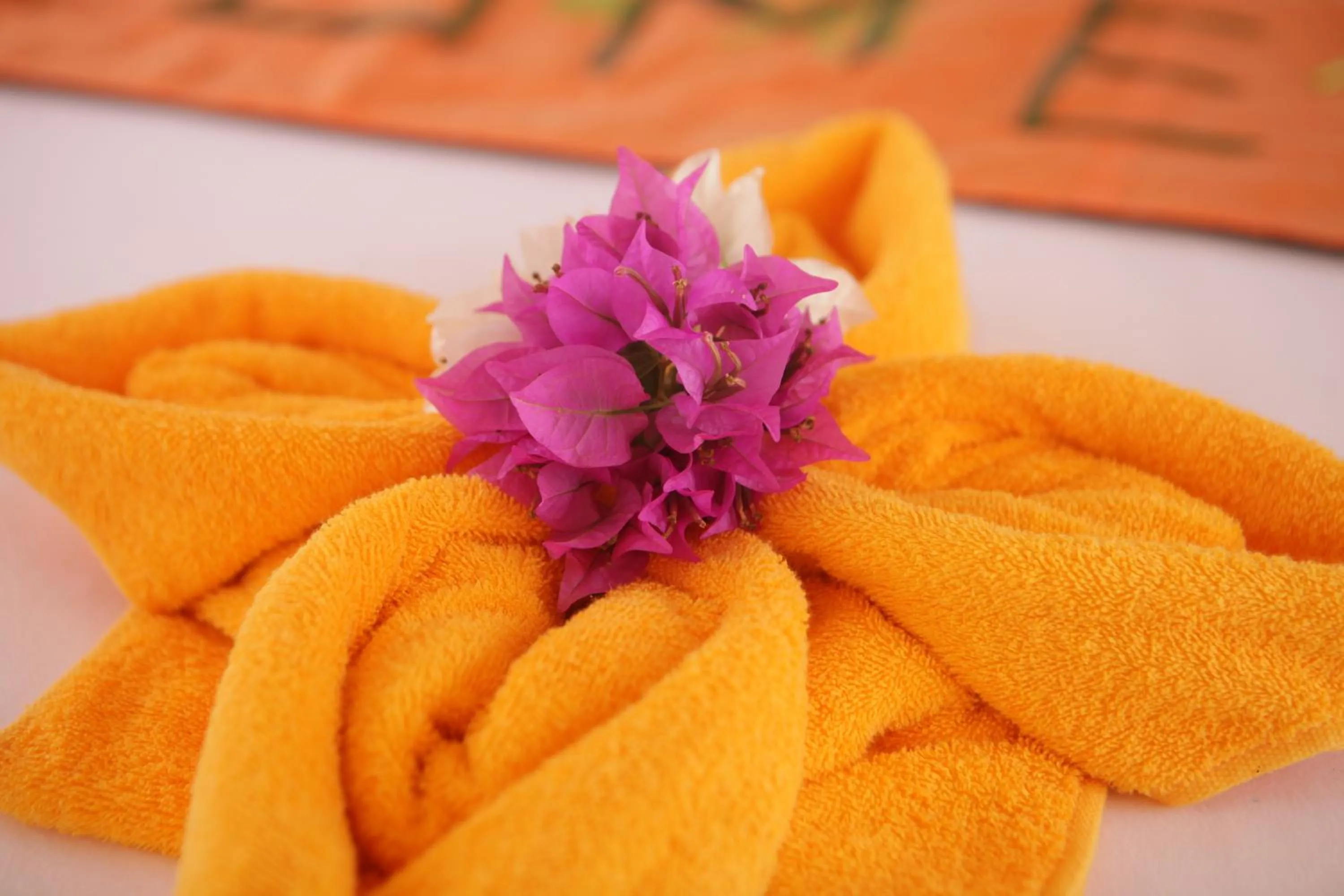 Bed in Bastianos Bangka Dive Resort