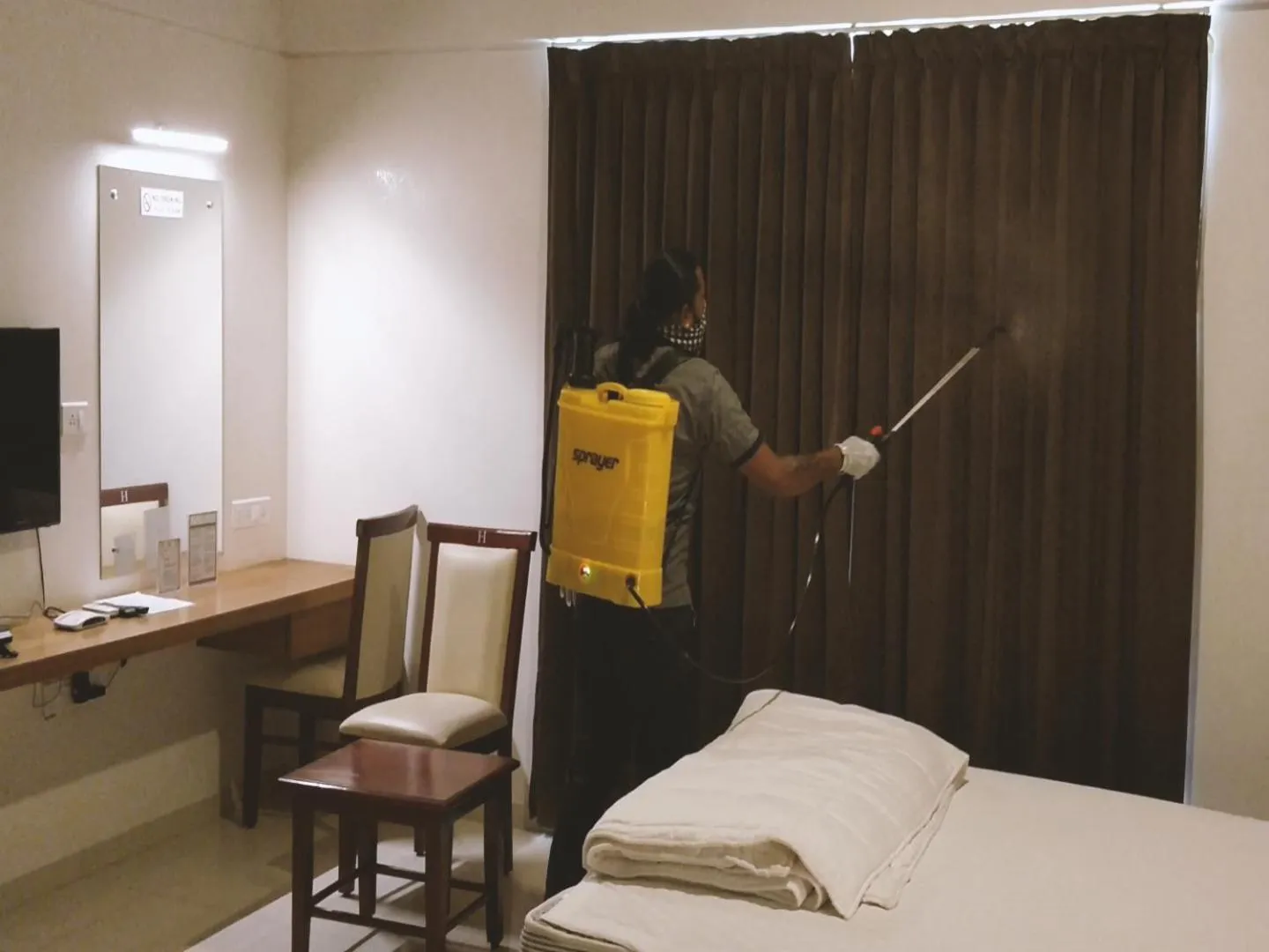 Staff, Bed in Heritage Inn