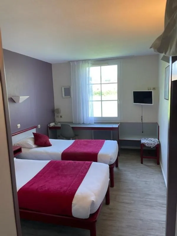 Bed in Hotel Saint Odilon