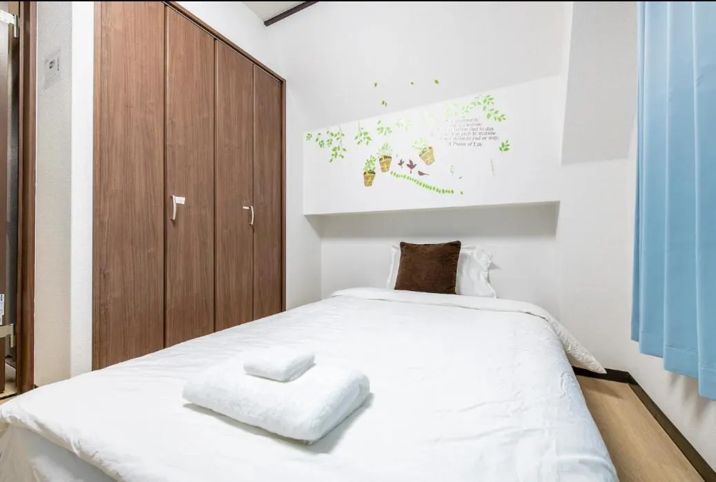 Bed in Uhome Tabata Apartment