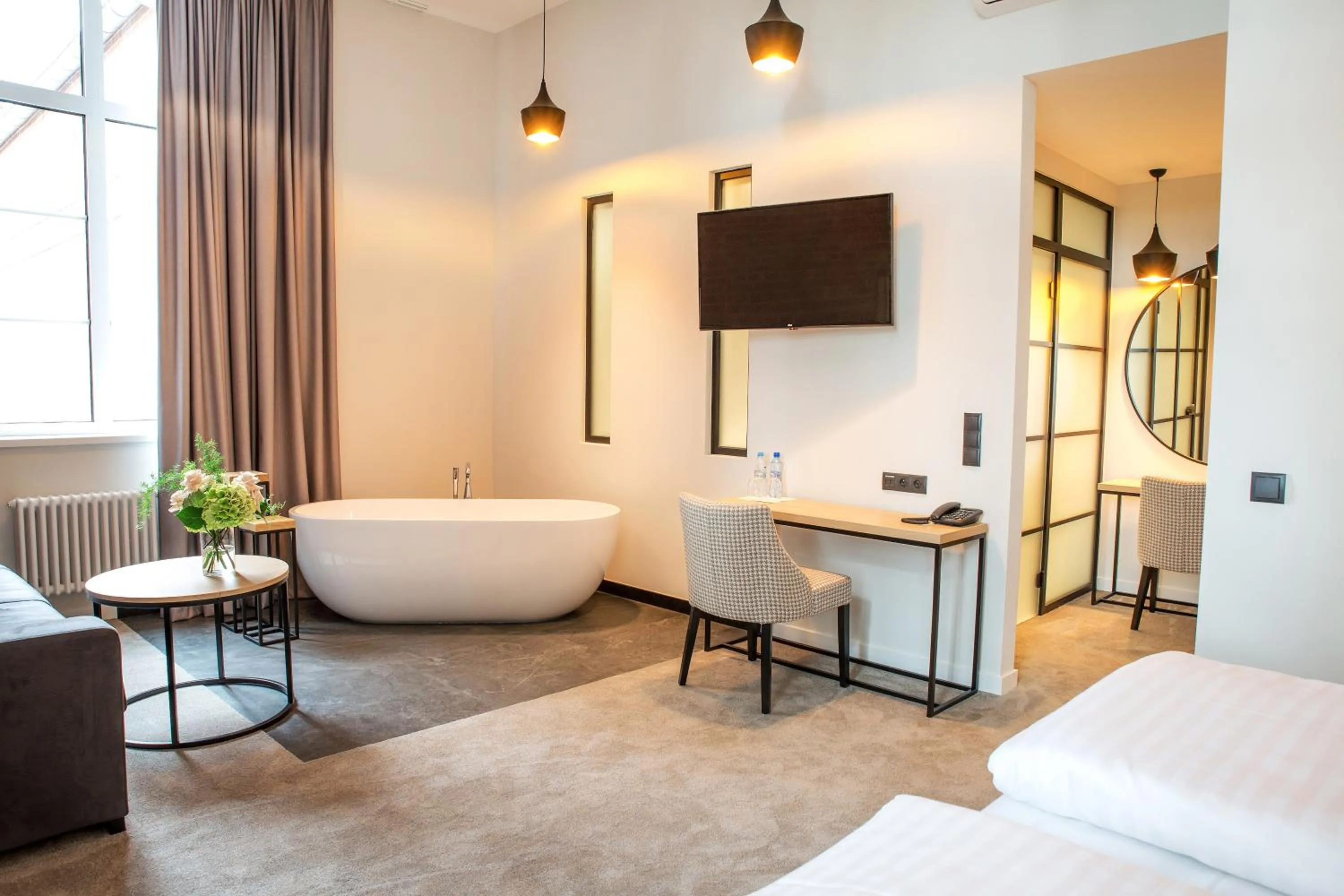 Bed in Hotel Hugo Business & Spa