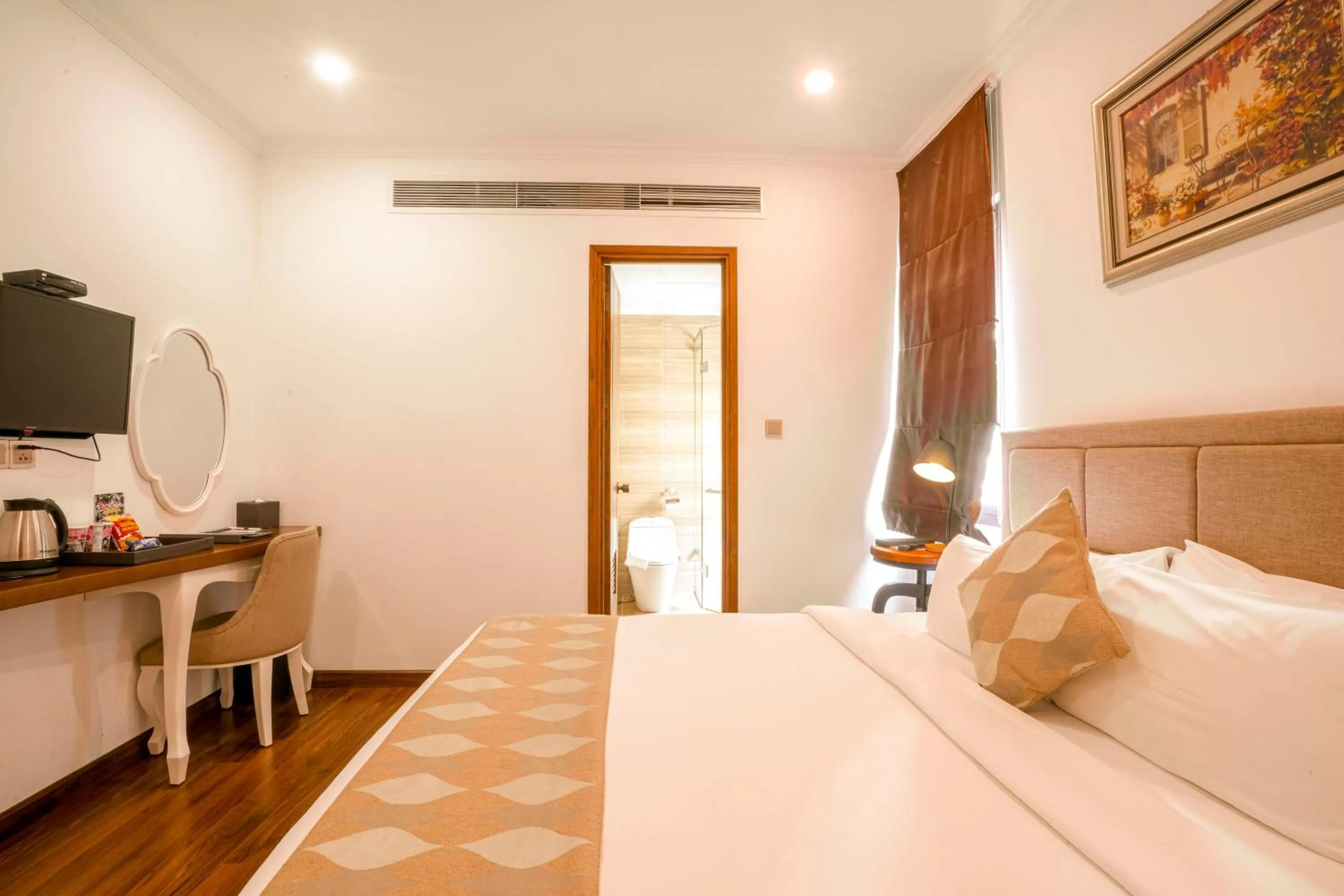 Bed in Nesta Hotel Saigon