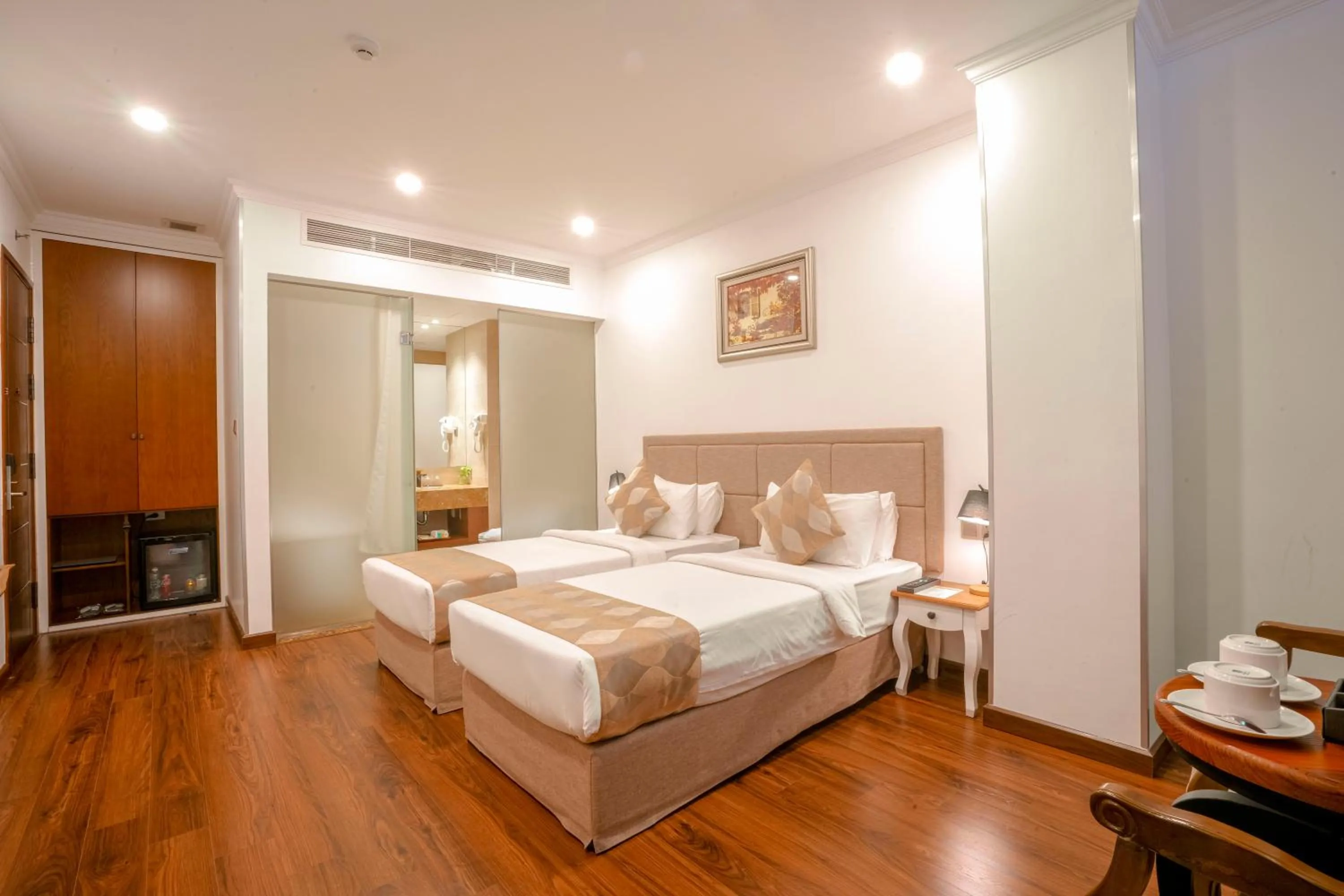 Bed in Nesta Hotel Saigon