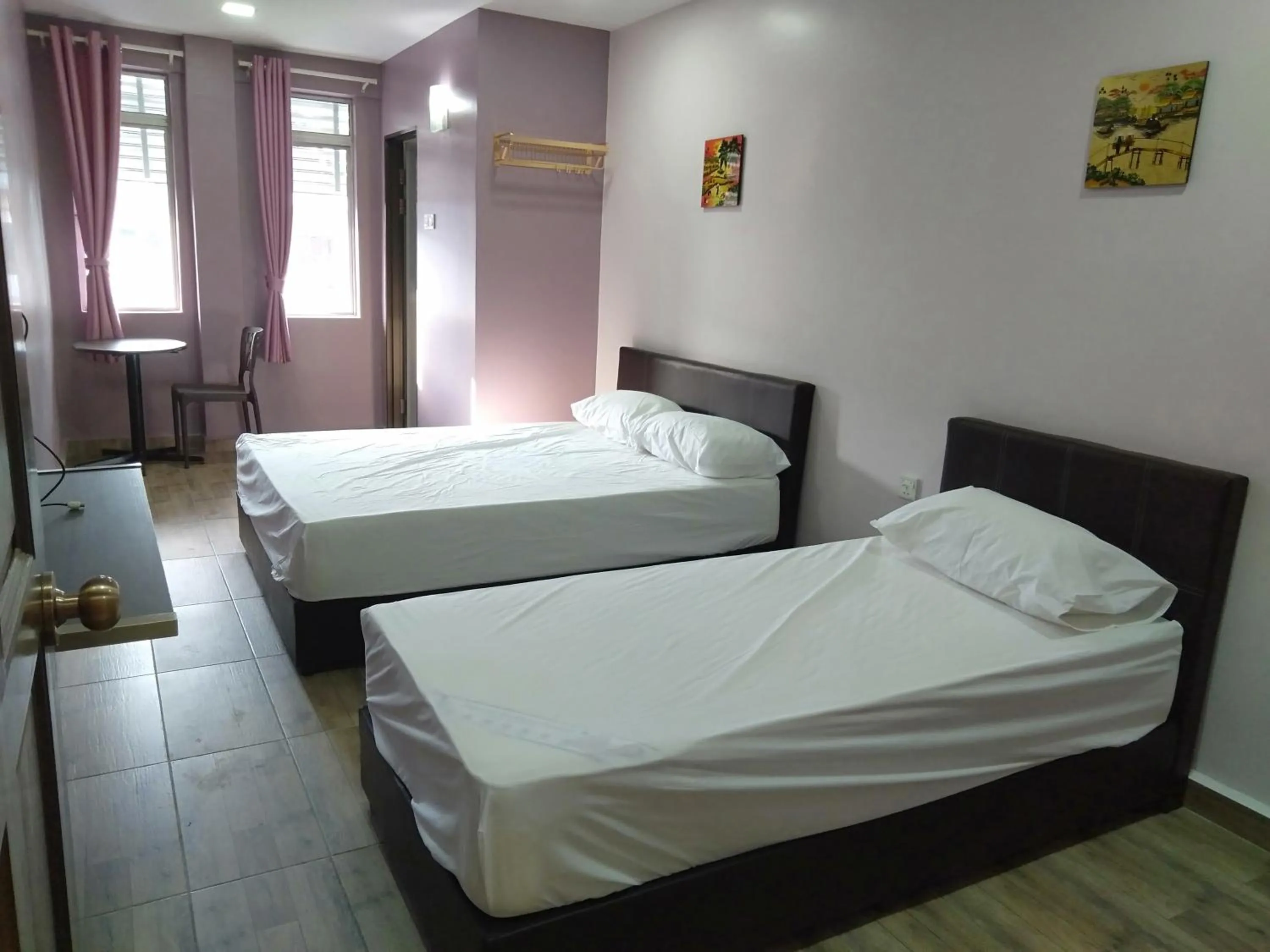 Photo of the whole room, Bed in Purple Dream Home