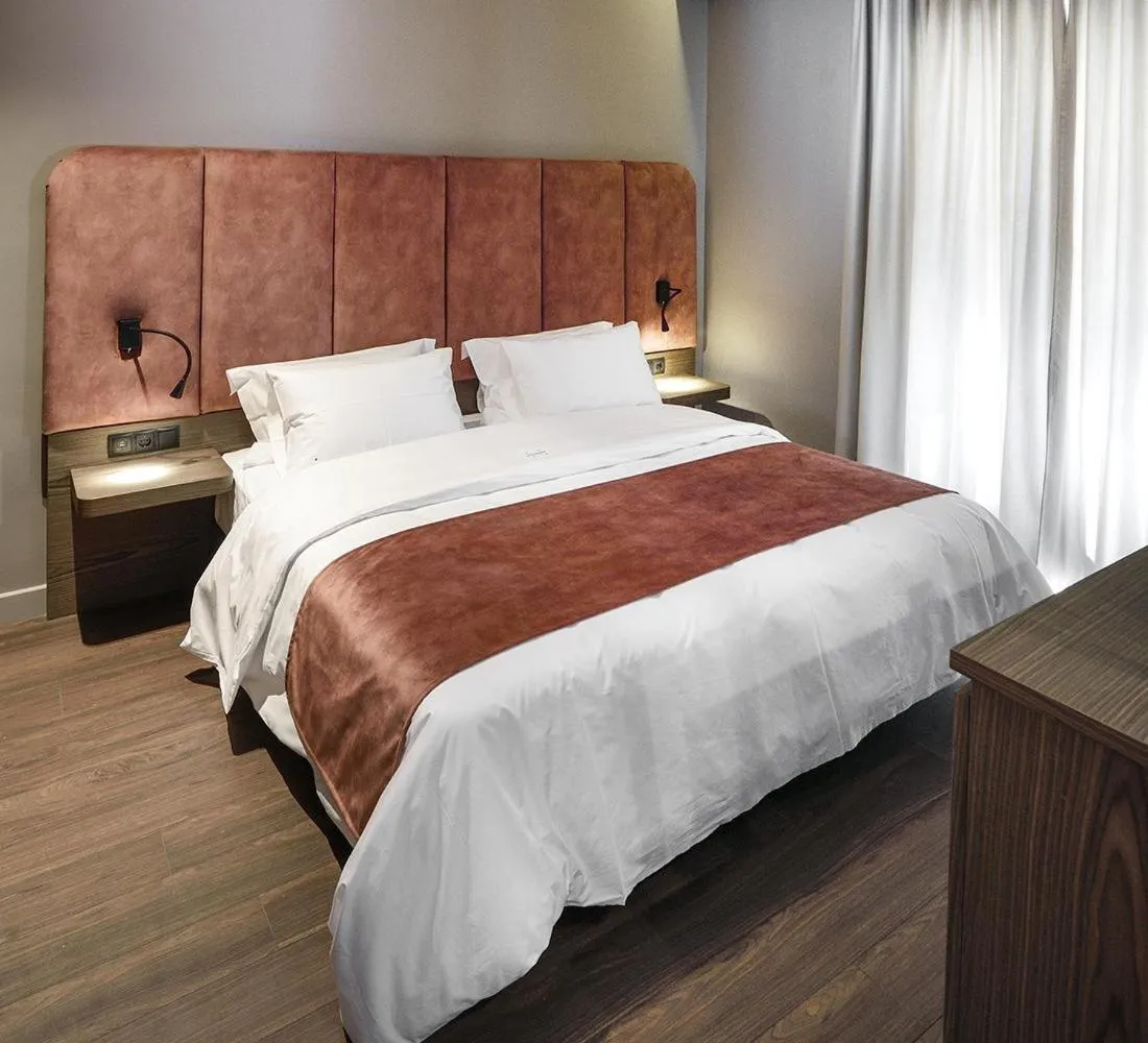 Bedroom, Bed in Roomore Apartments