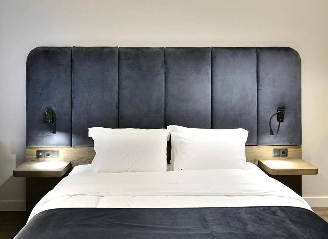 Bedroom, Bed in Roomore Apartments