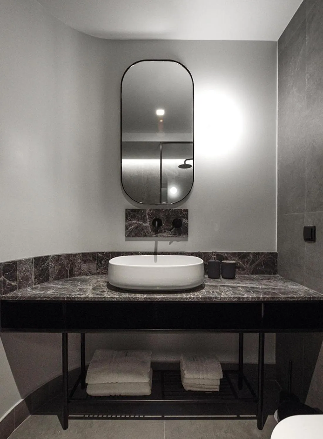 Bathroom in Roomore Apartments