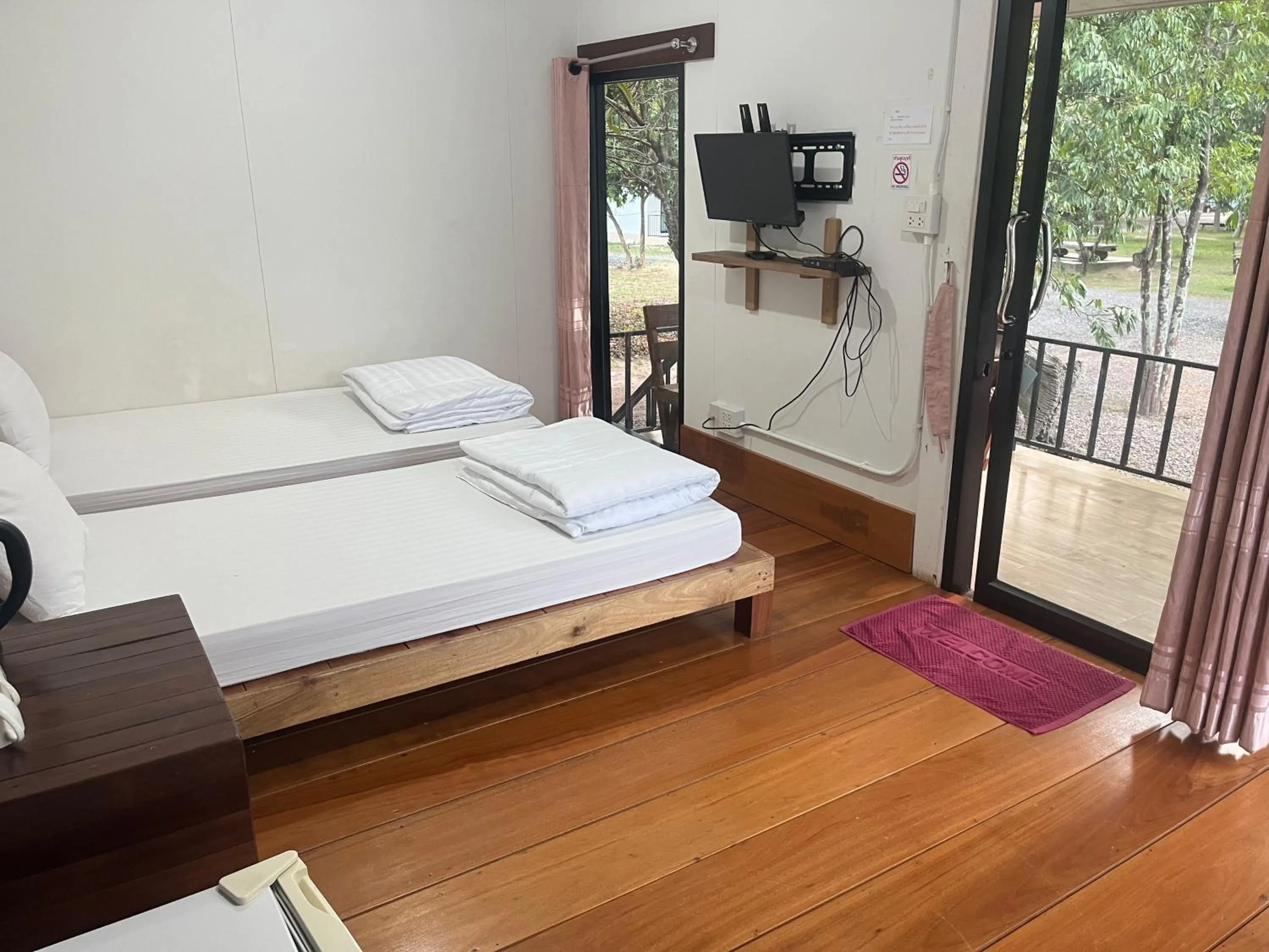 Bed in Sangkaset Resort