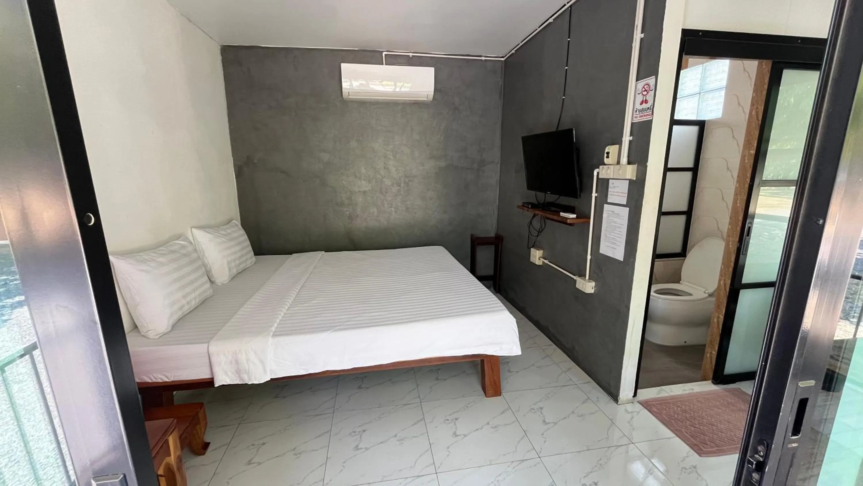 Bed in Sangkaset Resort