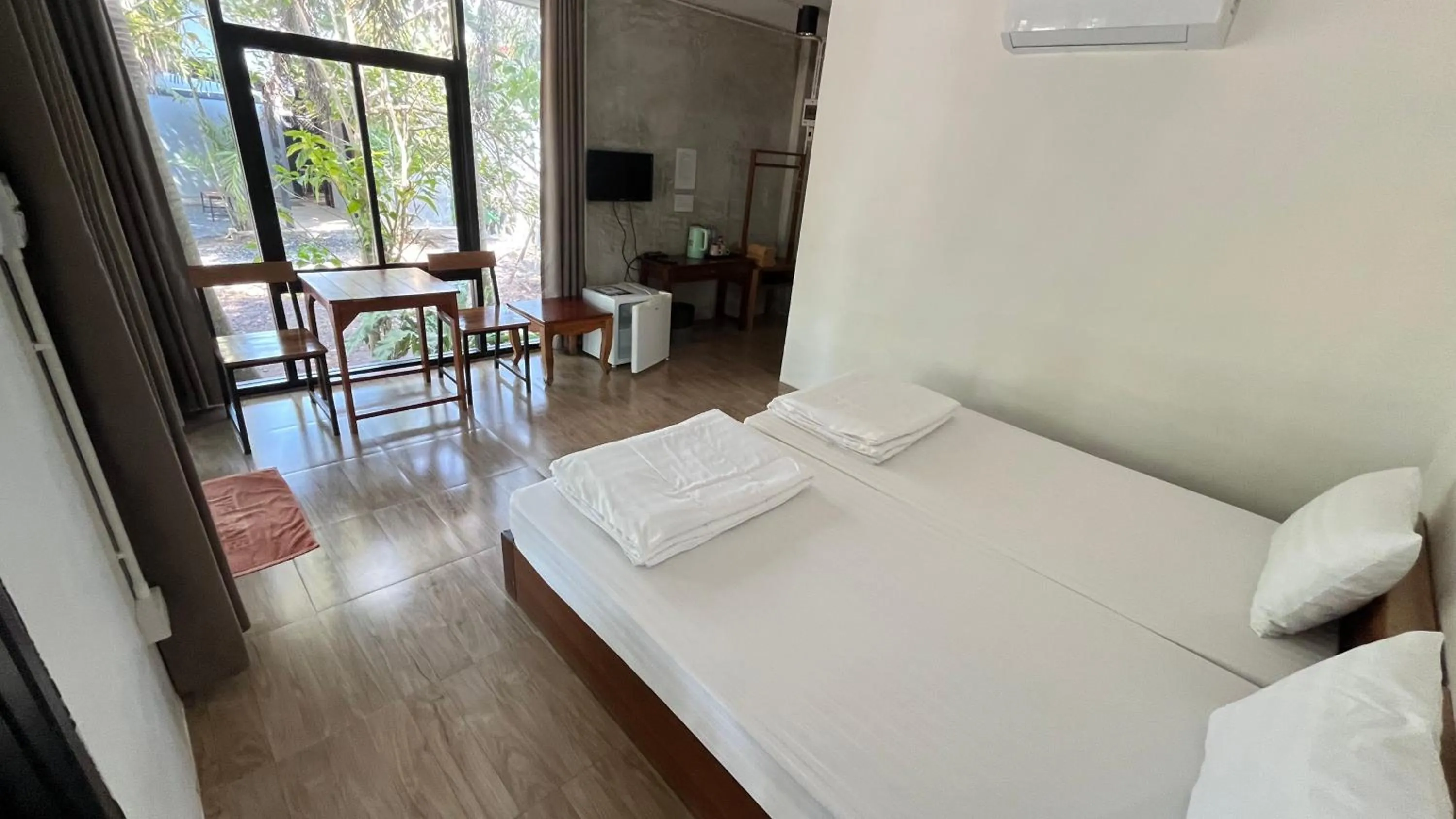 Bed in Sangkaset Resort