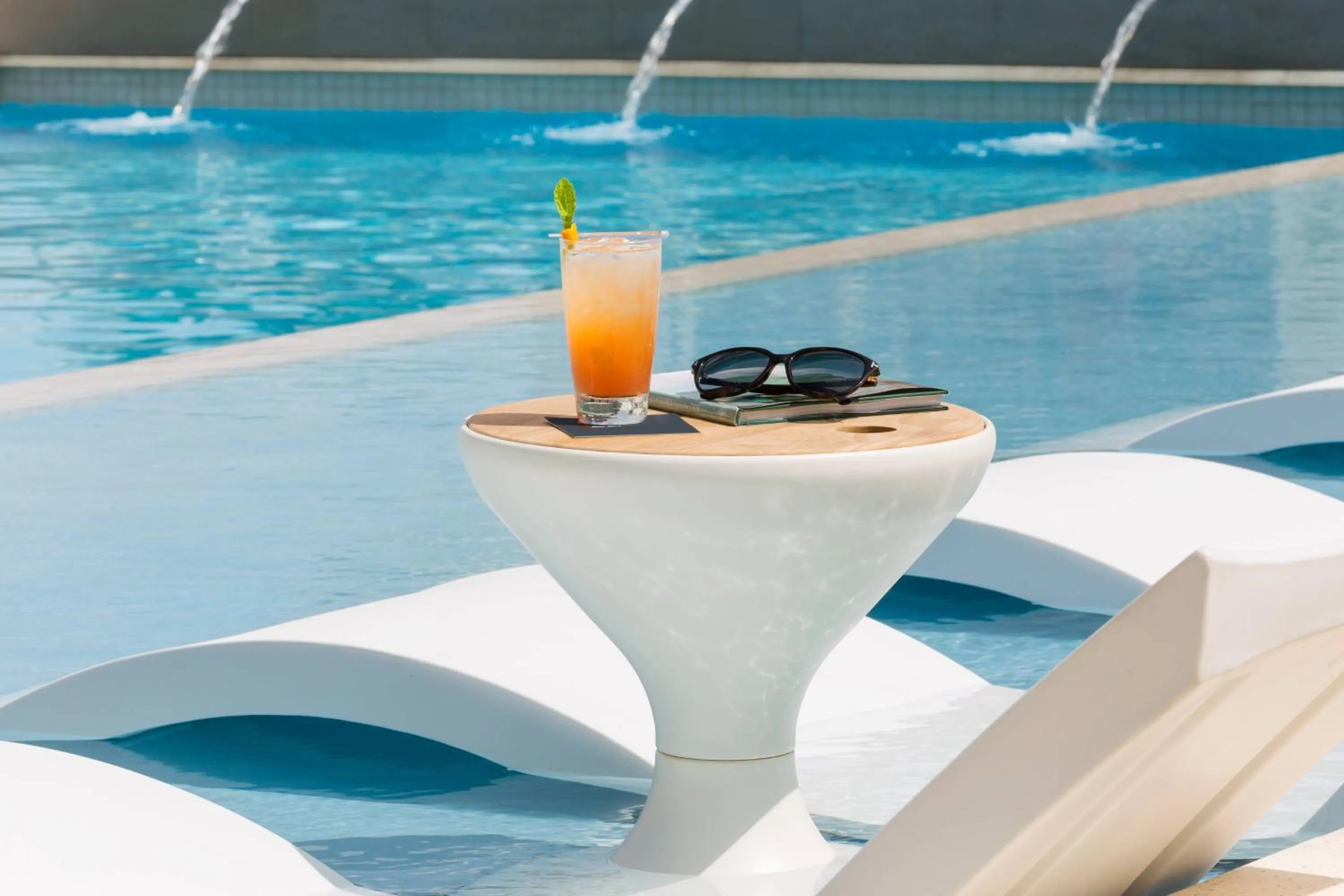 Swimming pool in AC Hotel by Marriott San Juan Condado