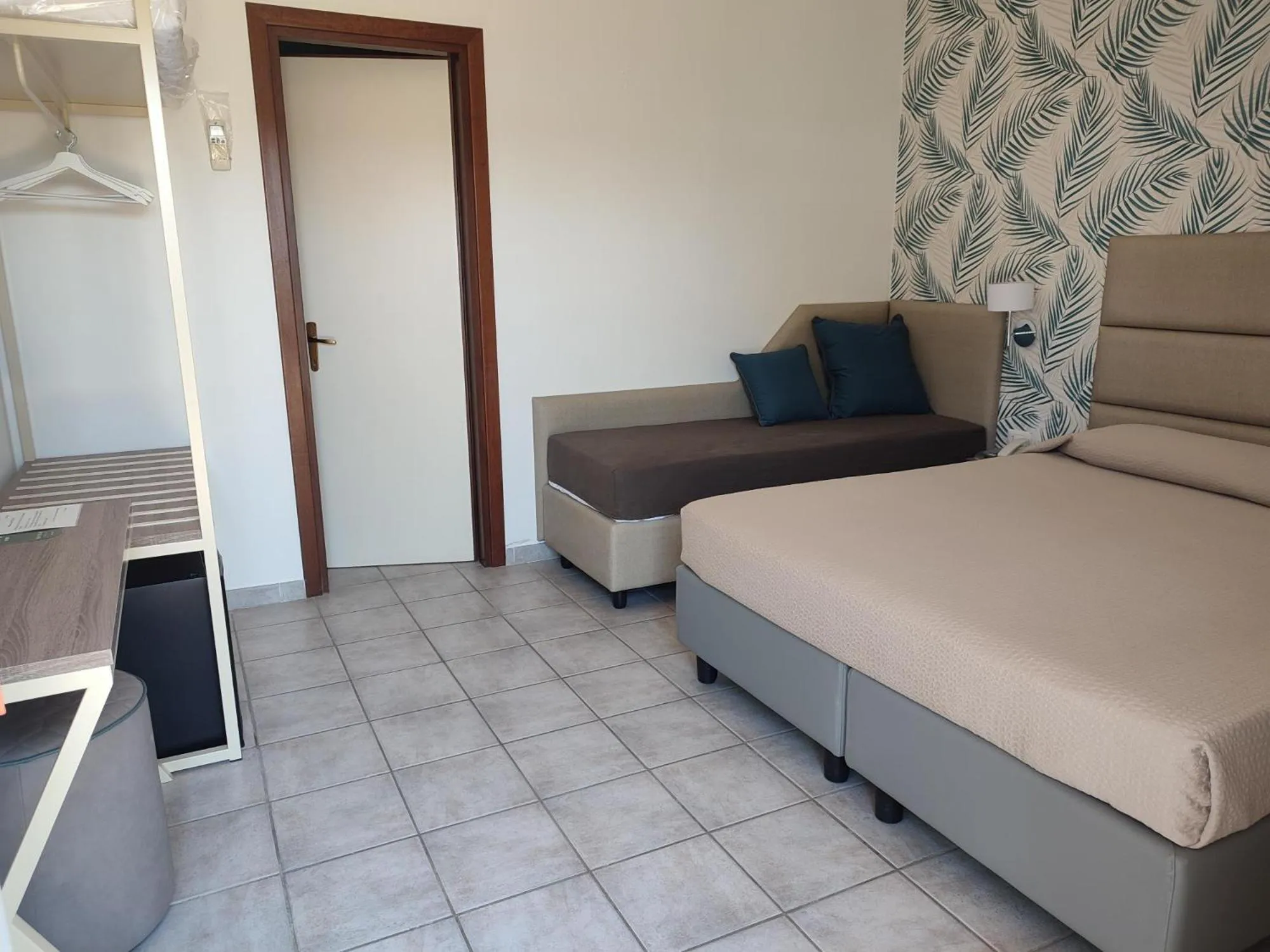 Bed in Hotel Le Palme