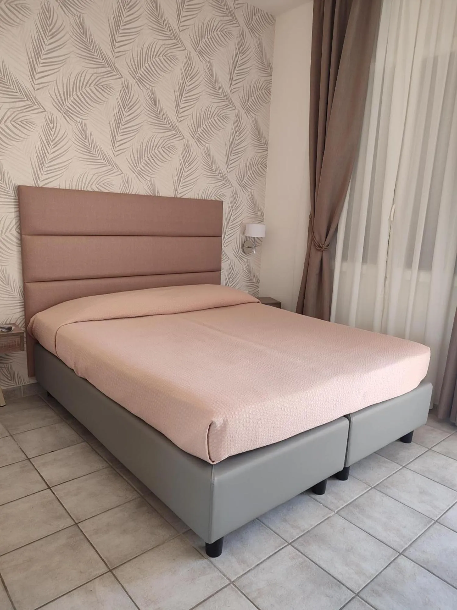 Bed in Hotel Le Palme