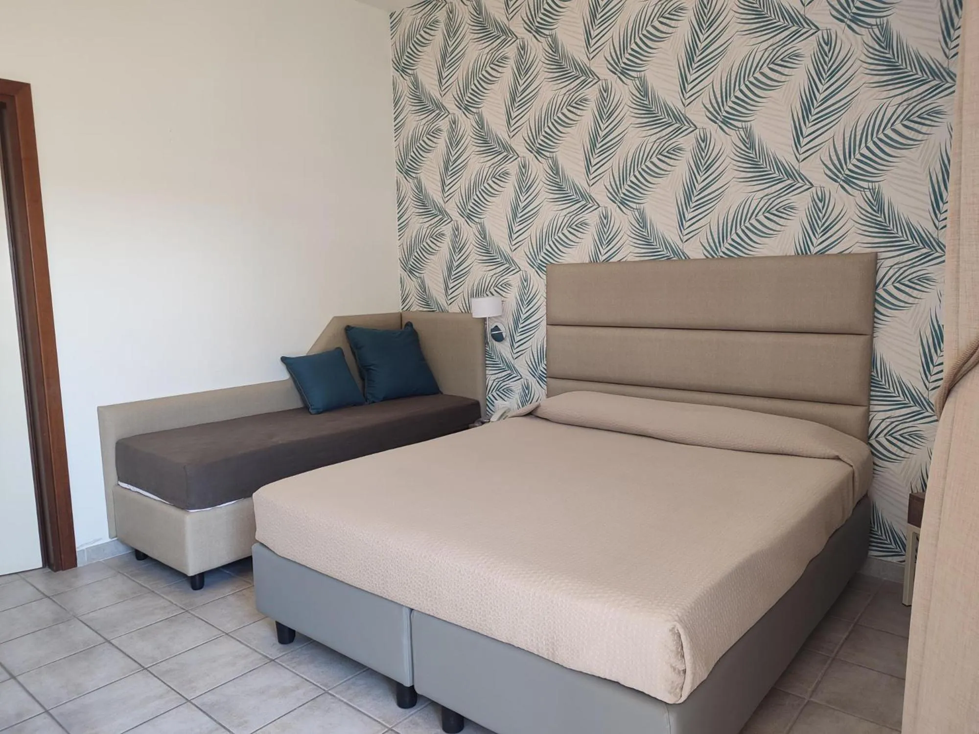 Bed in Hotel Le Palme