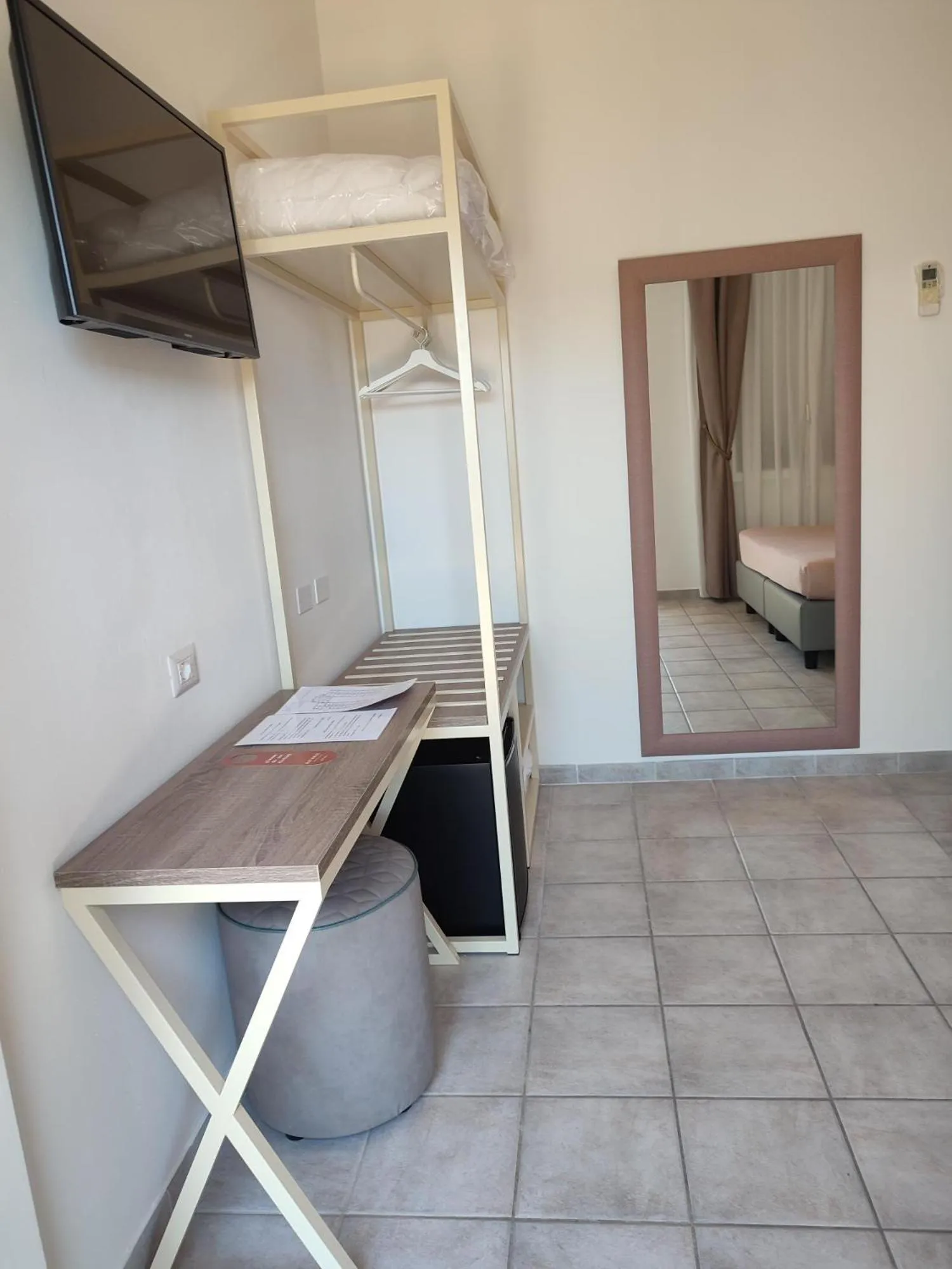 Bed in Hotel Le Palme