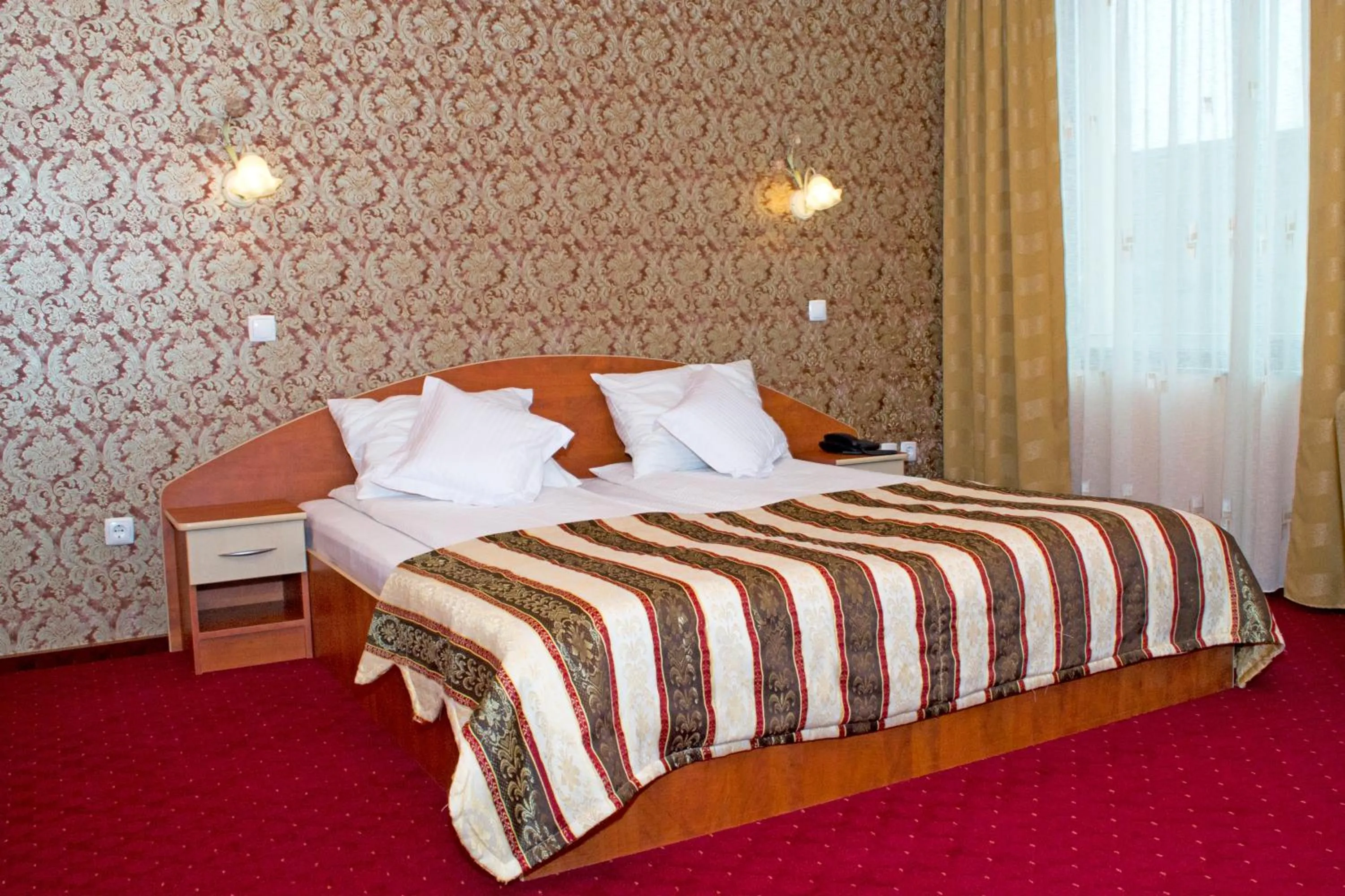 Bed in Hotel Xemar