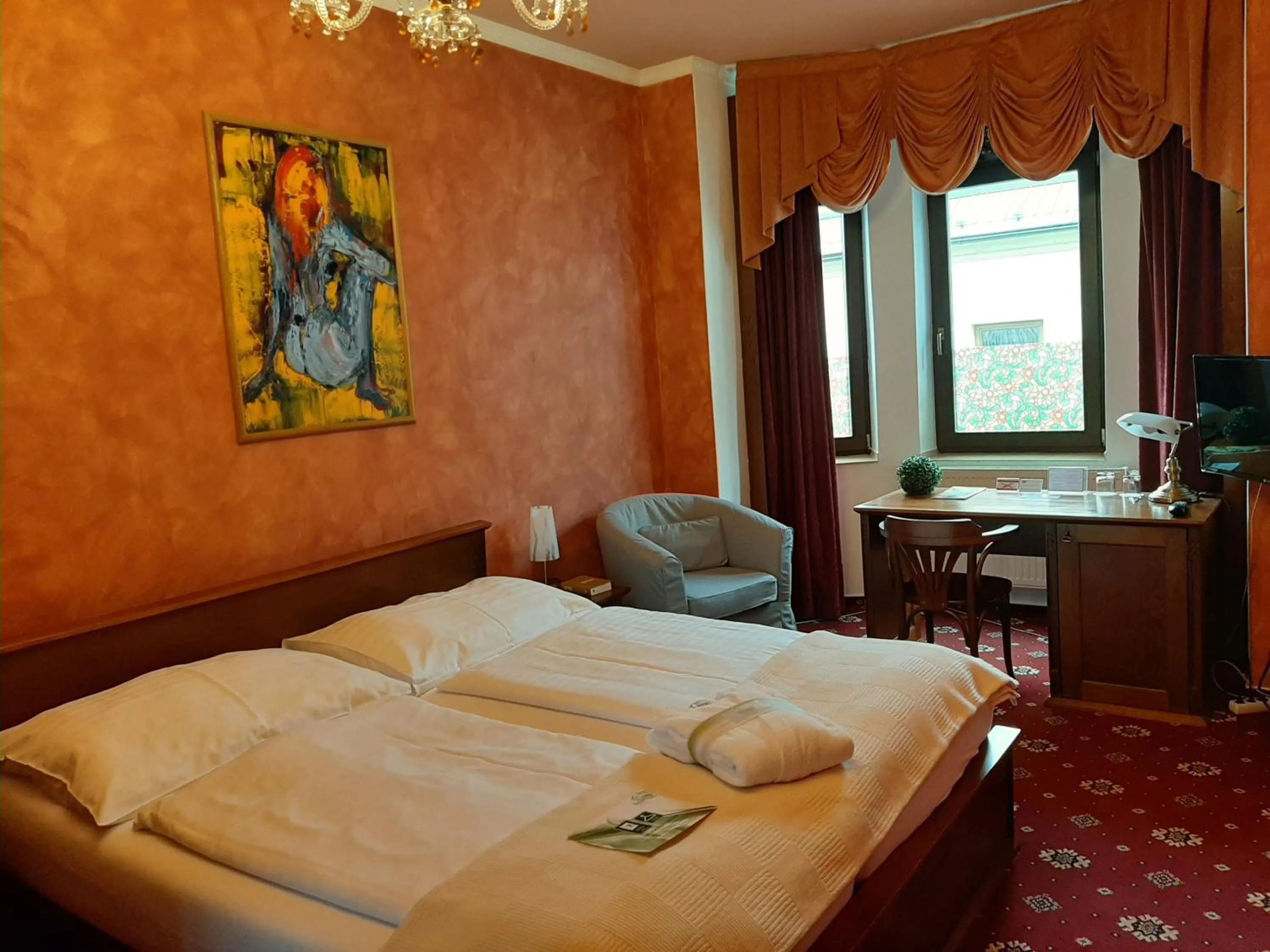 Bed in Brioni Suites