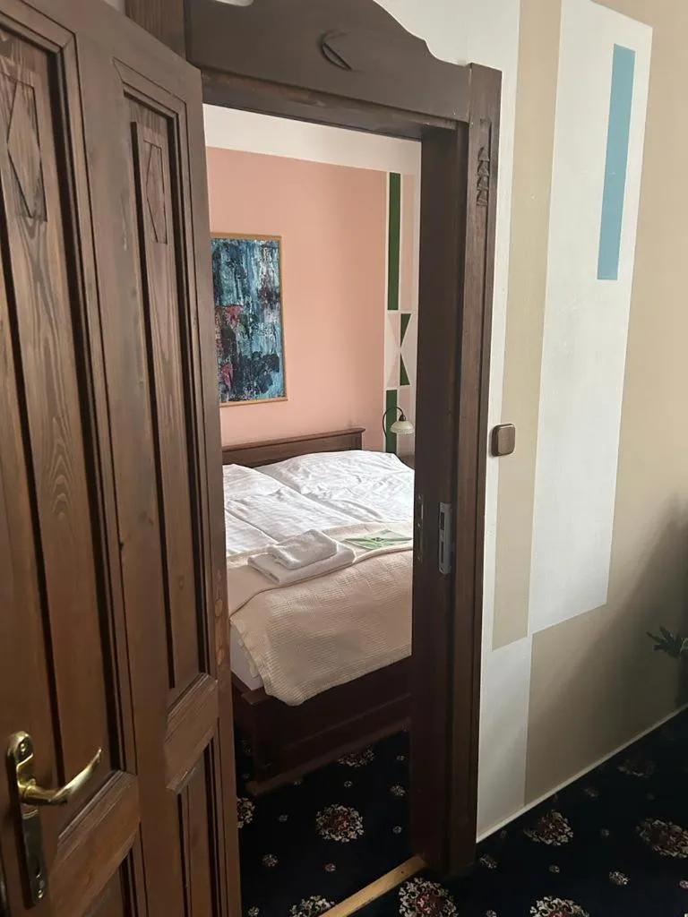 Bed in Brioni Suites