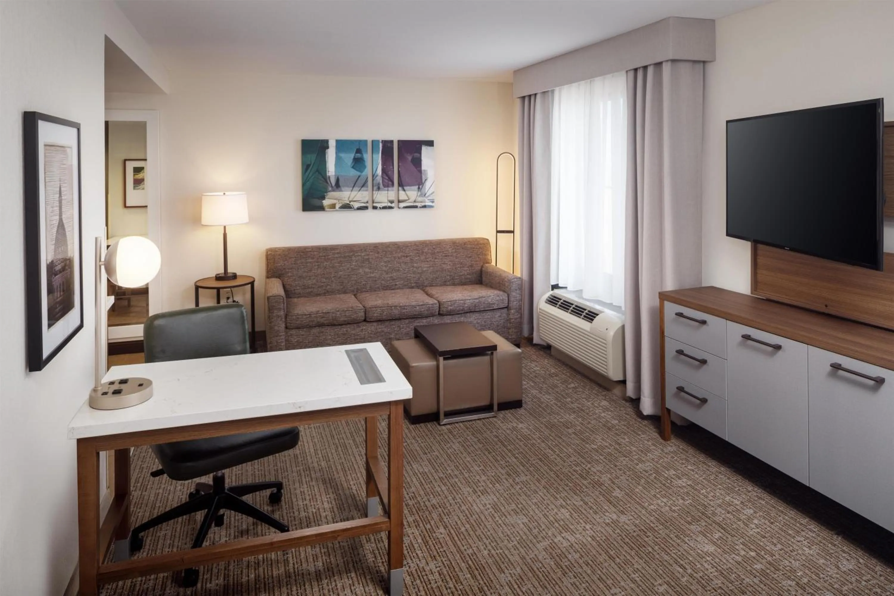 Bedroom in Homewood Suites by Hilton Denver International Airport