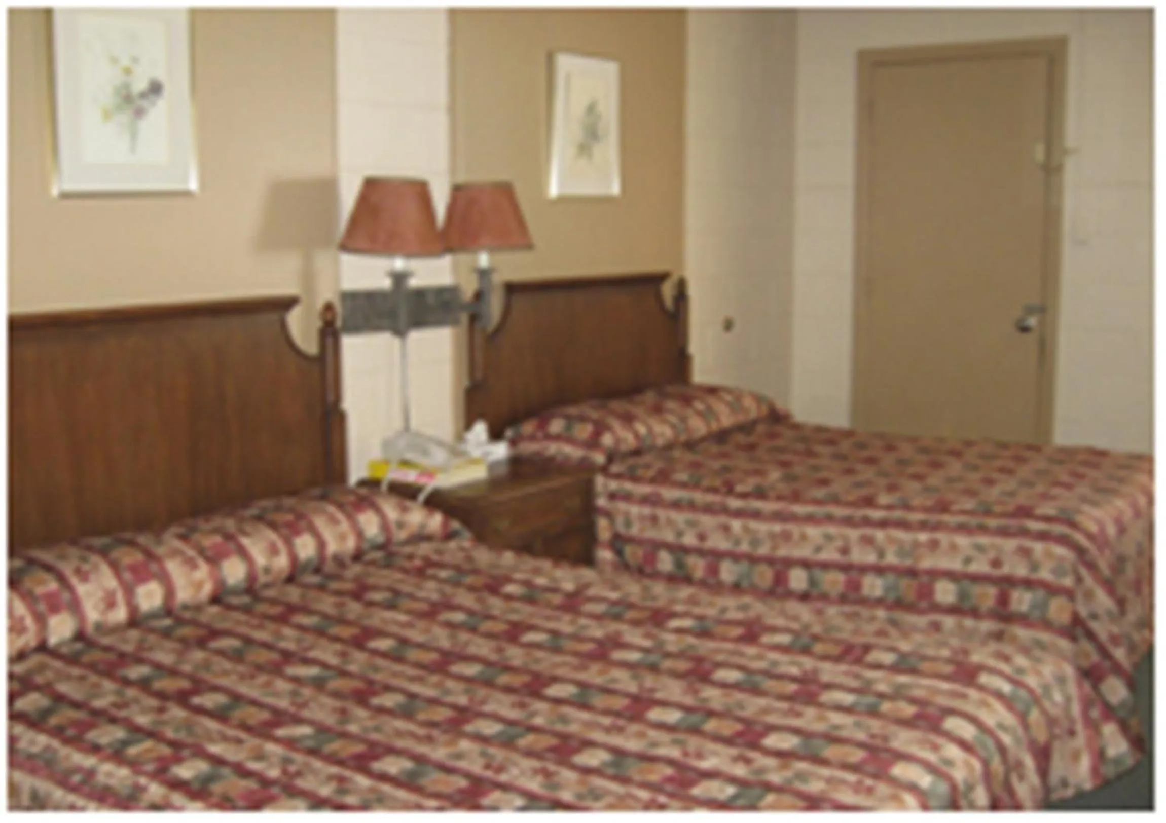 Bed in Motel Du Parc Masson