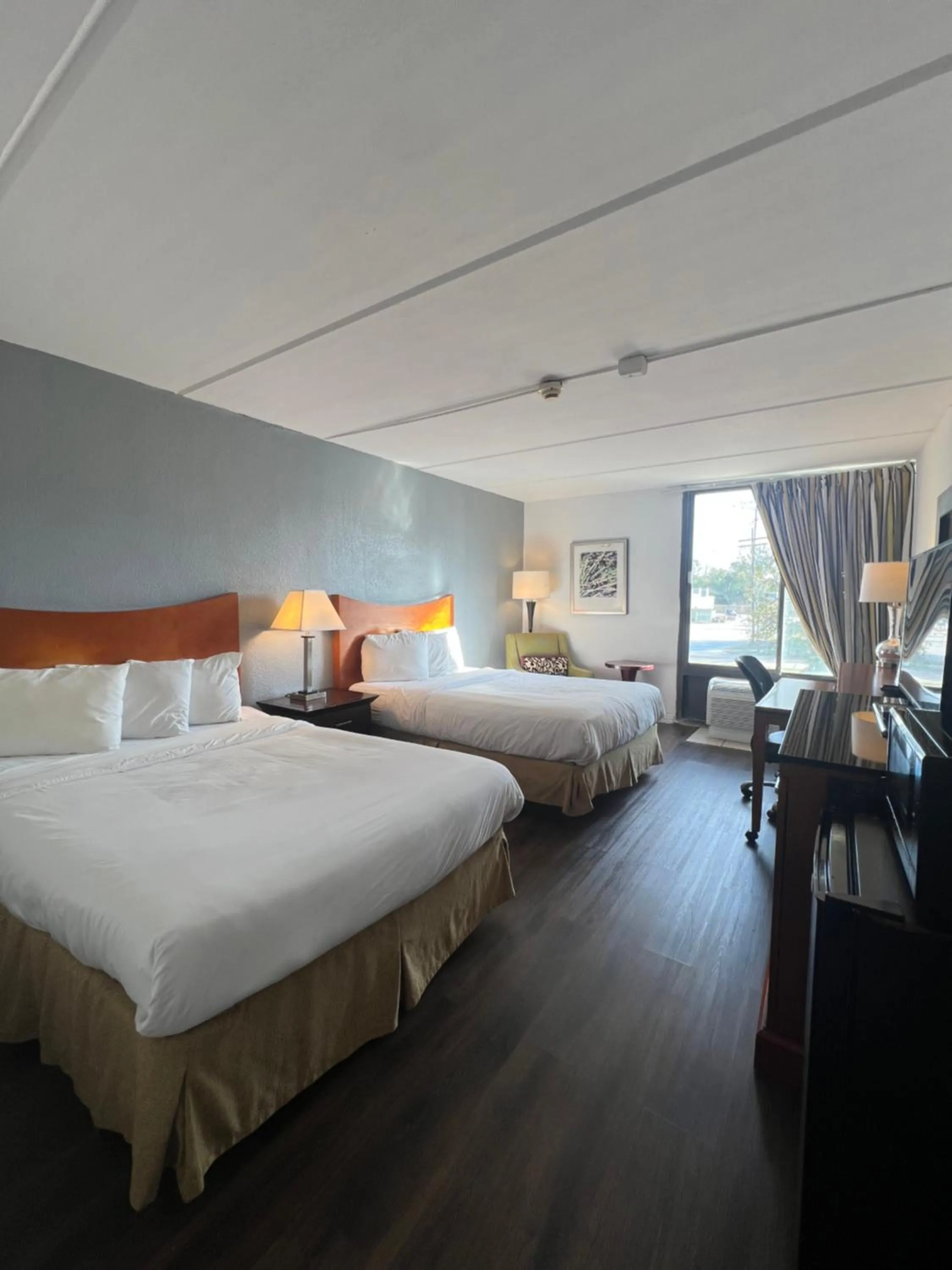 Bed in The Grand Hotel Spindletop