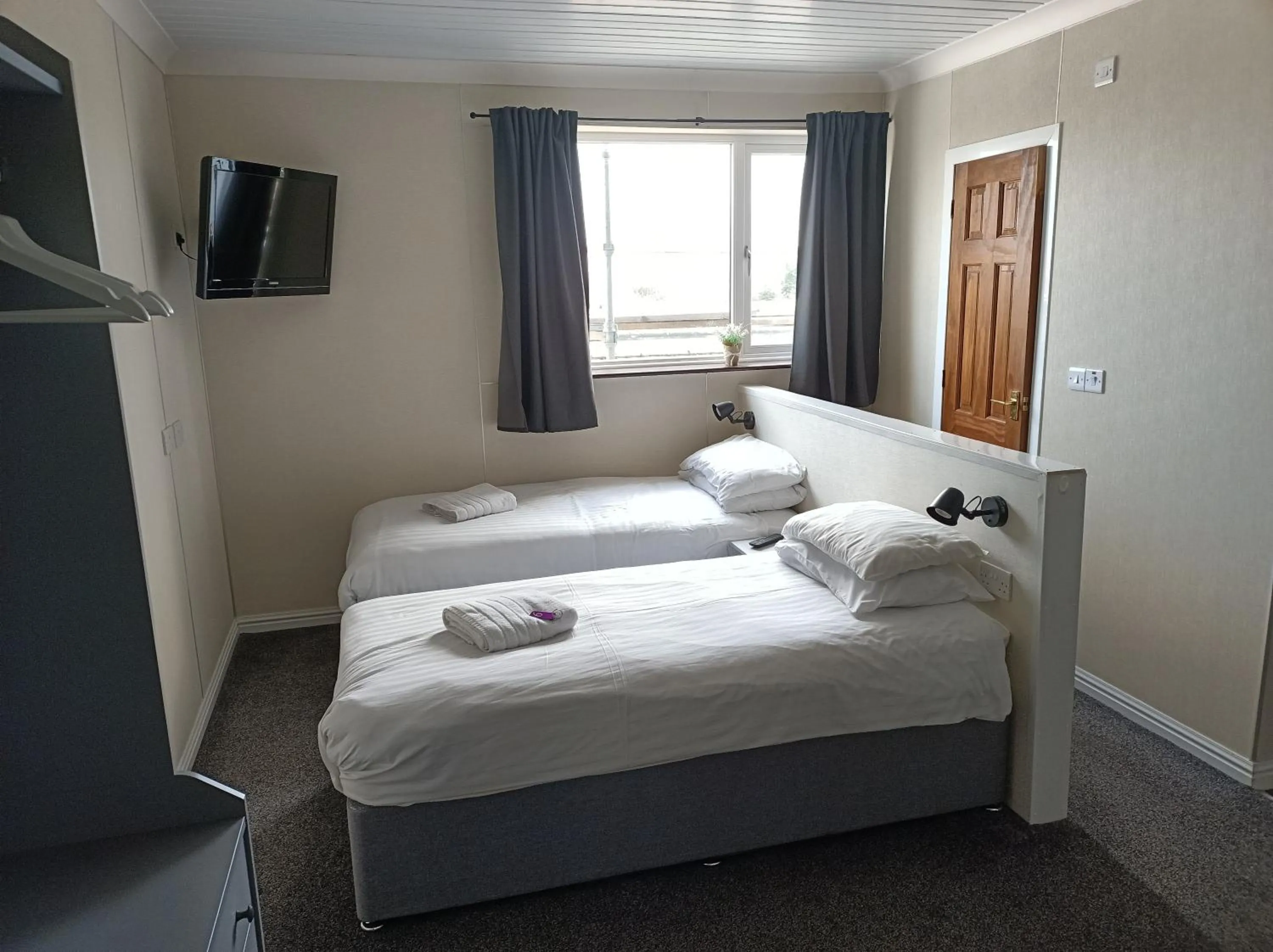 Bed in The Townhouse Accommodation