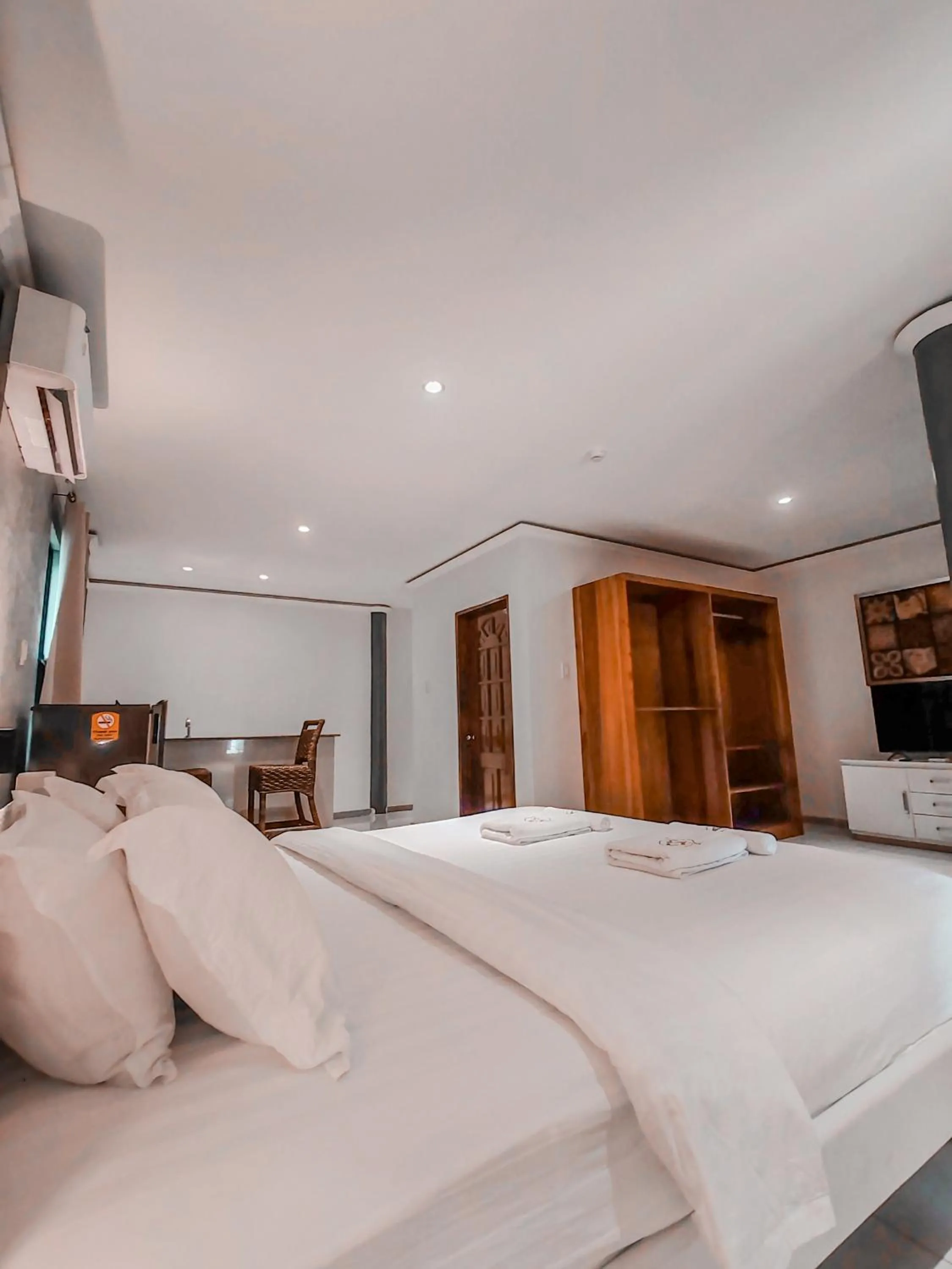 Bed in Alona Northland Resort