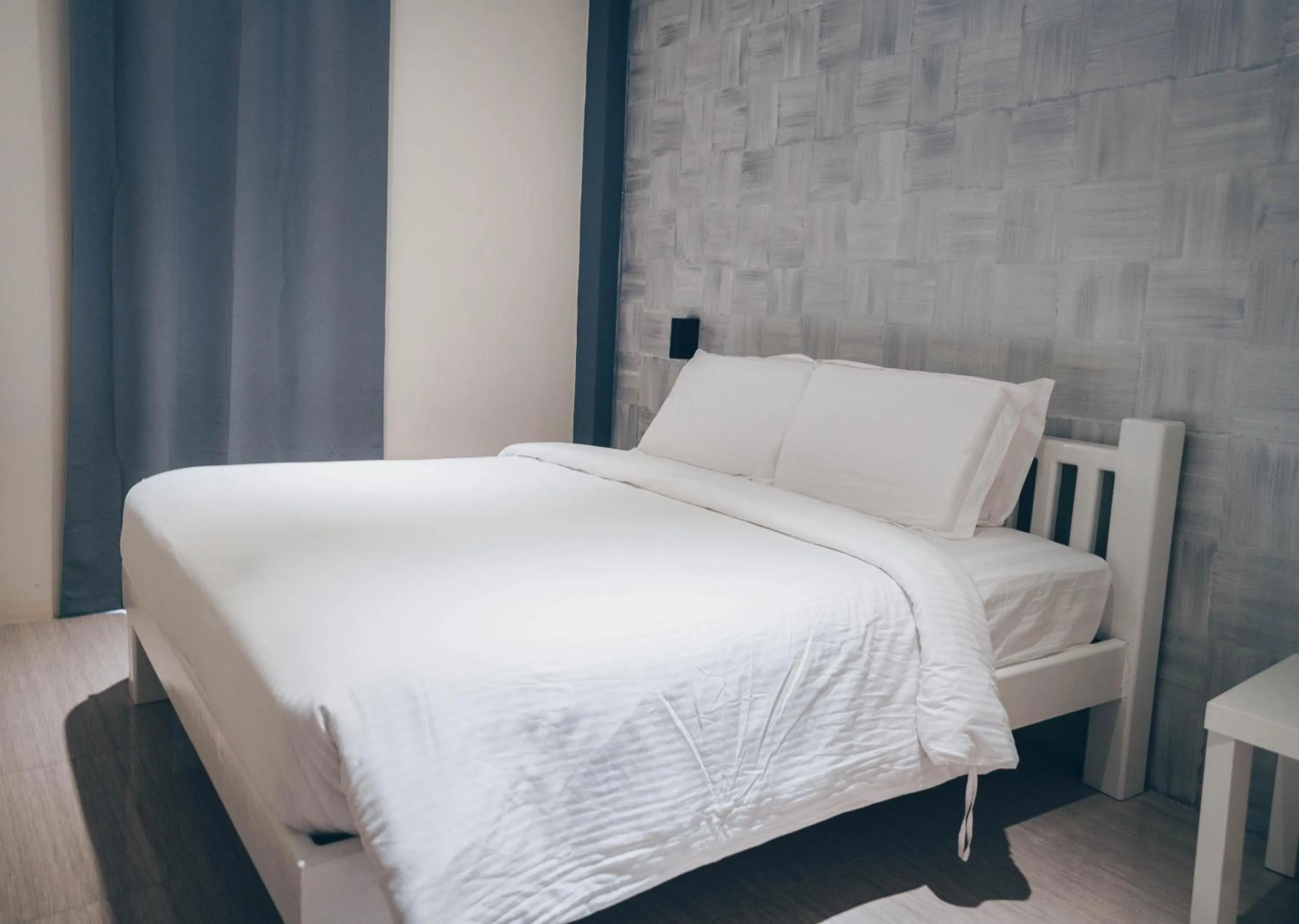 Bed in Alona Northland Resort