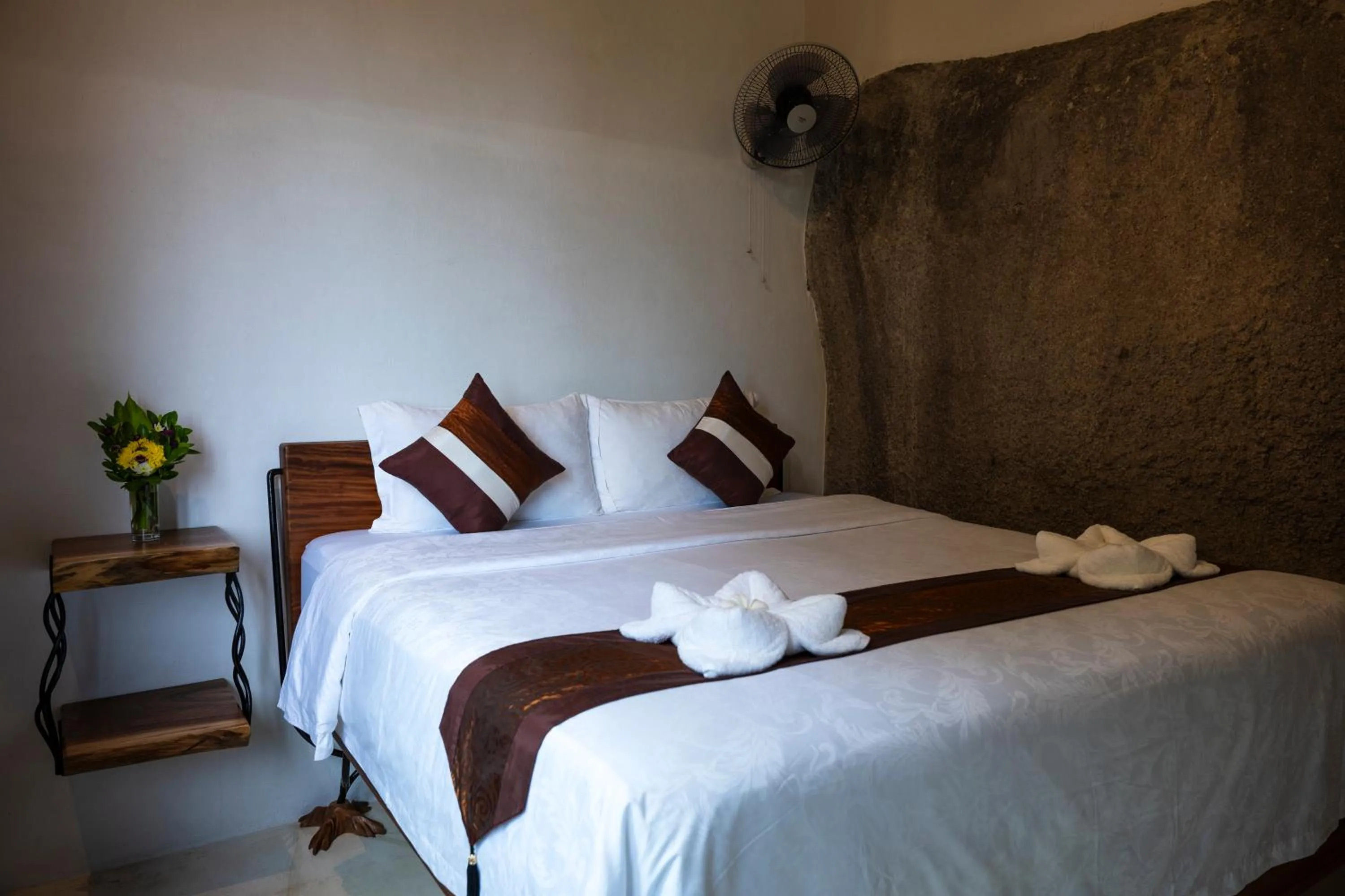 Bed in Monkey Flower Villas