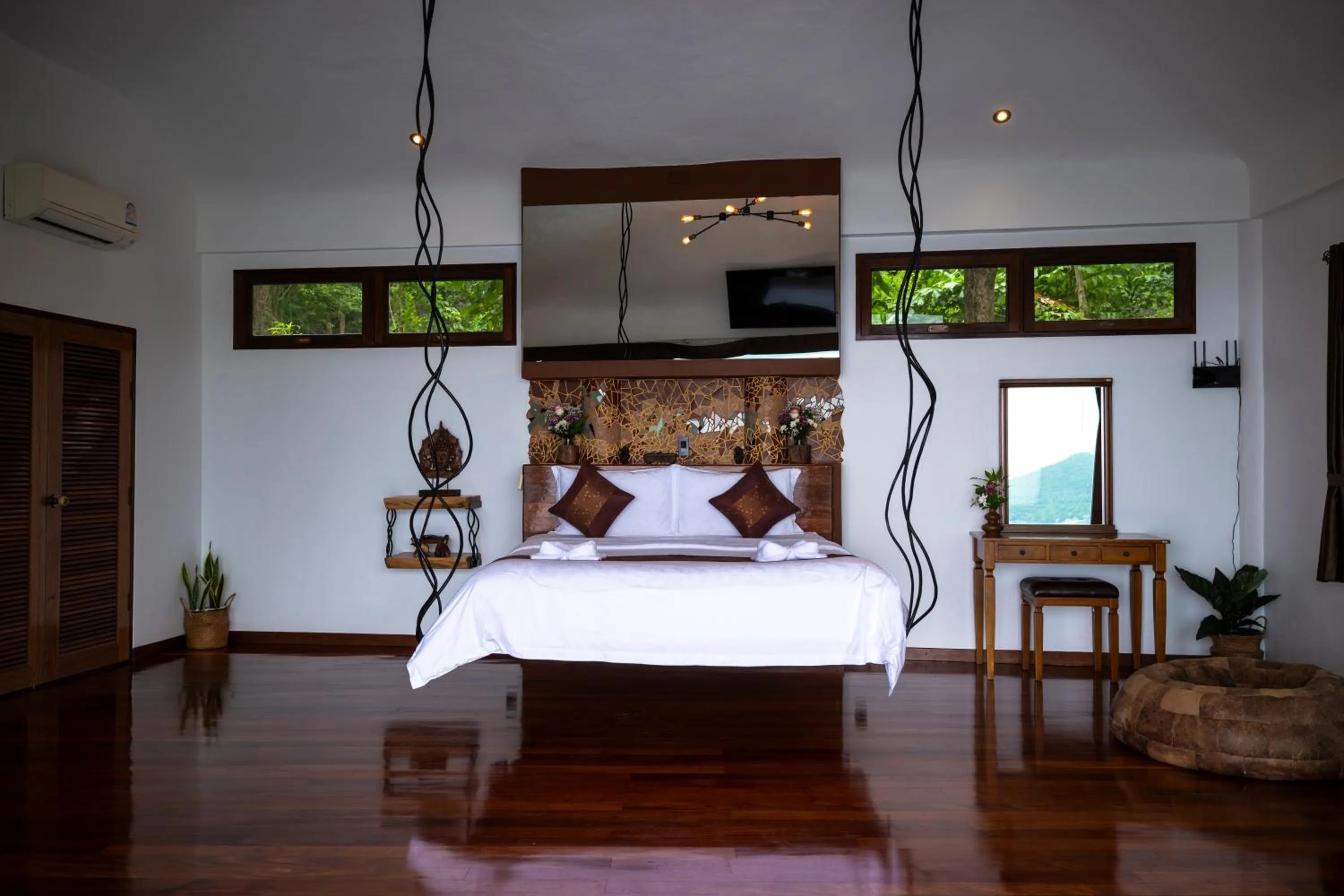 Bed in Monkey Flower Villas