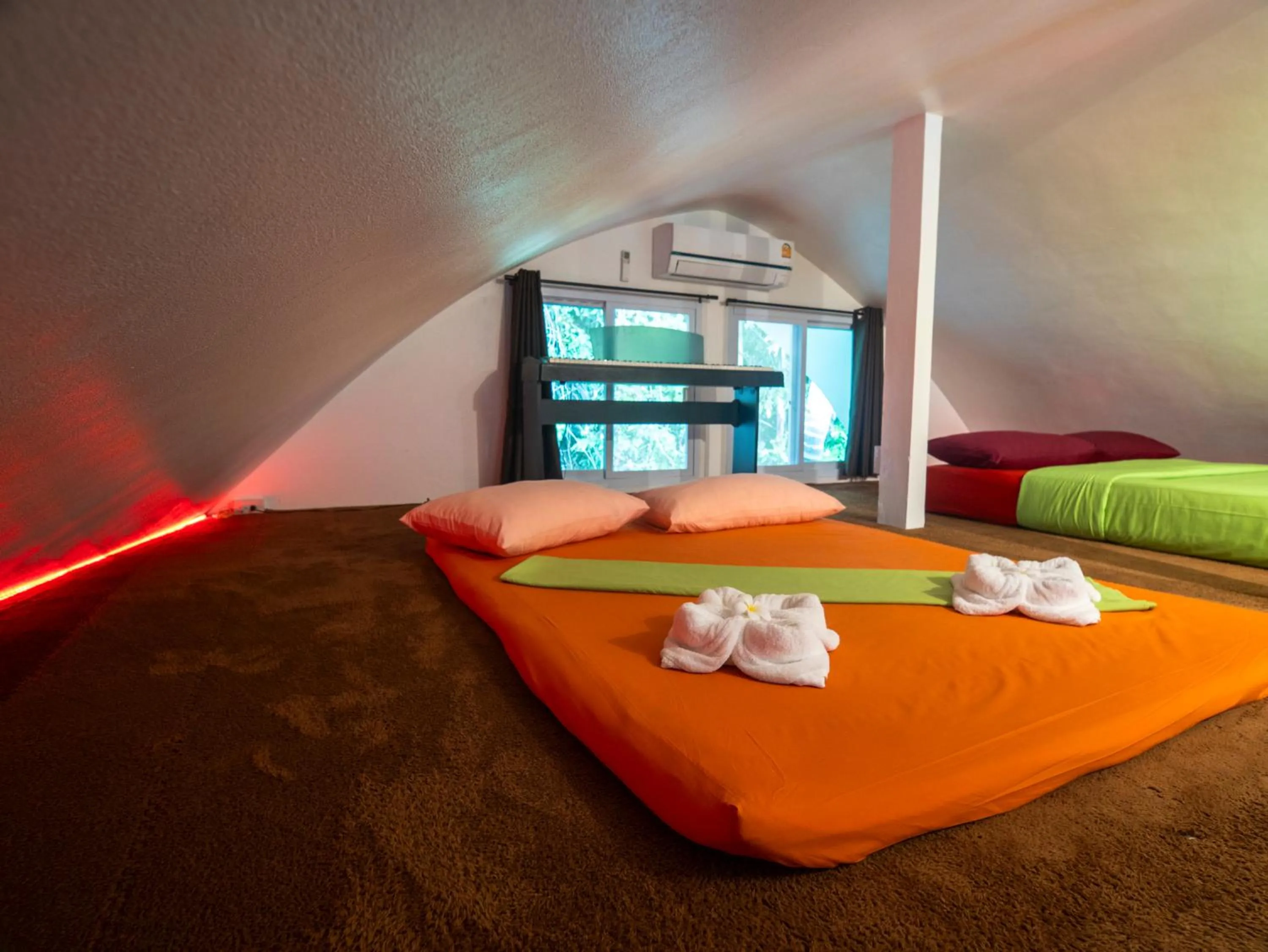 Bed in Monkey Flower Villas