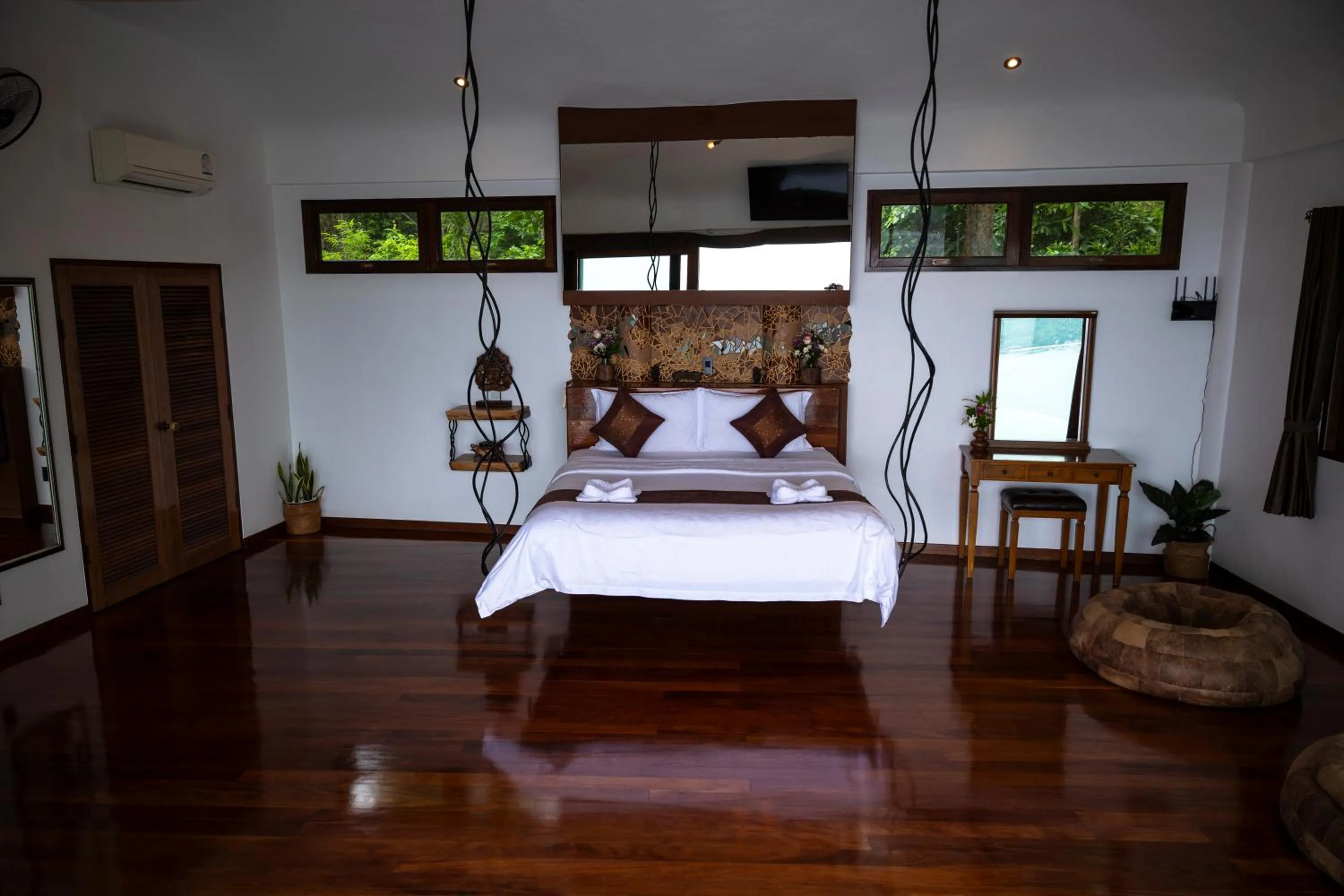 Bed in Monkey Flower Villas