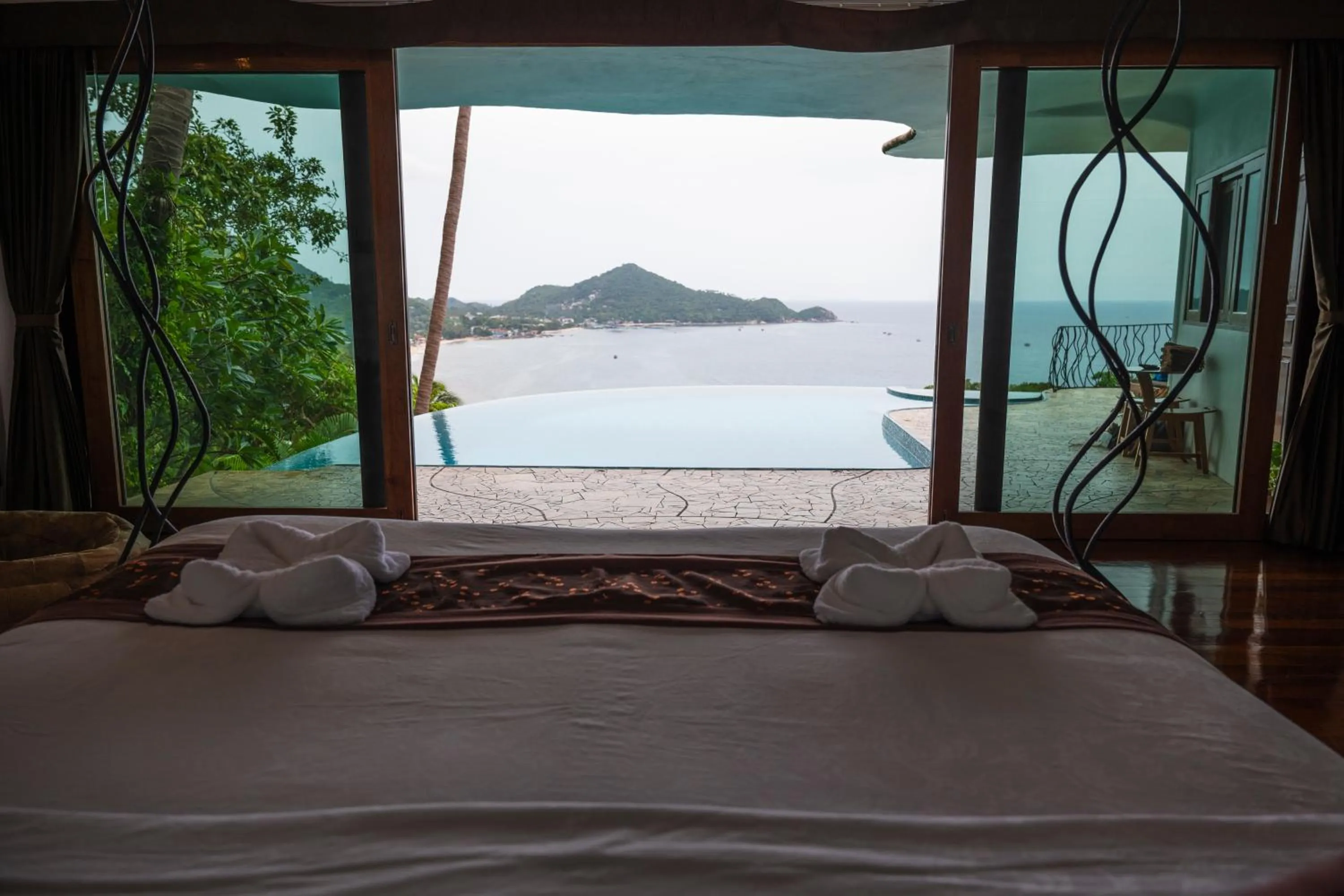 Bed in Monkey Flower Villas