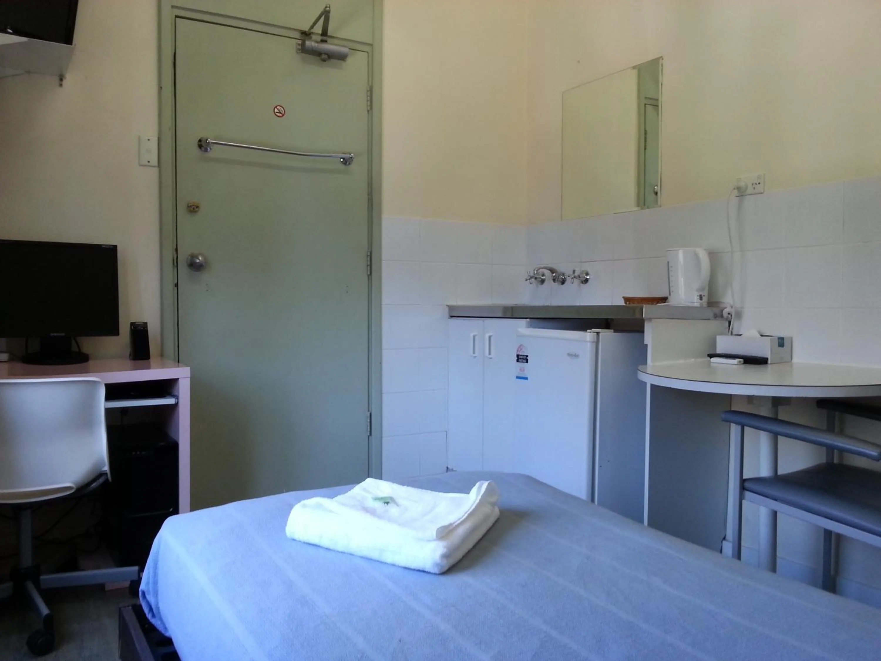 Photo of the whole room, Bed in Central Private Hotel