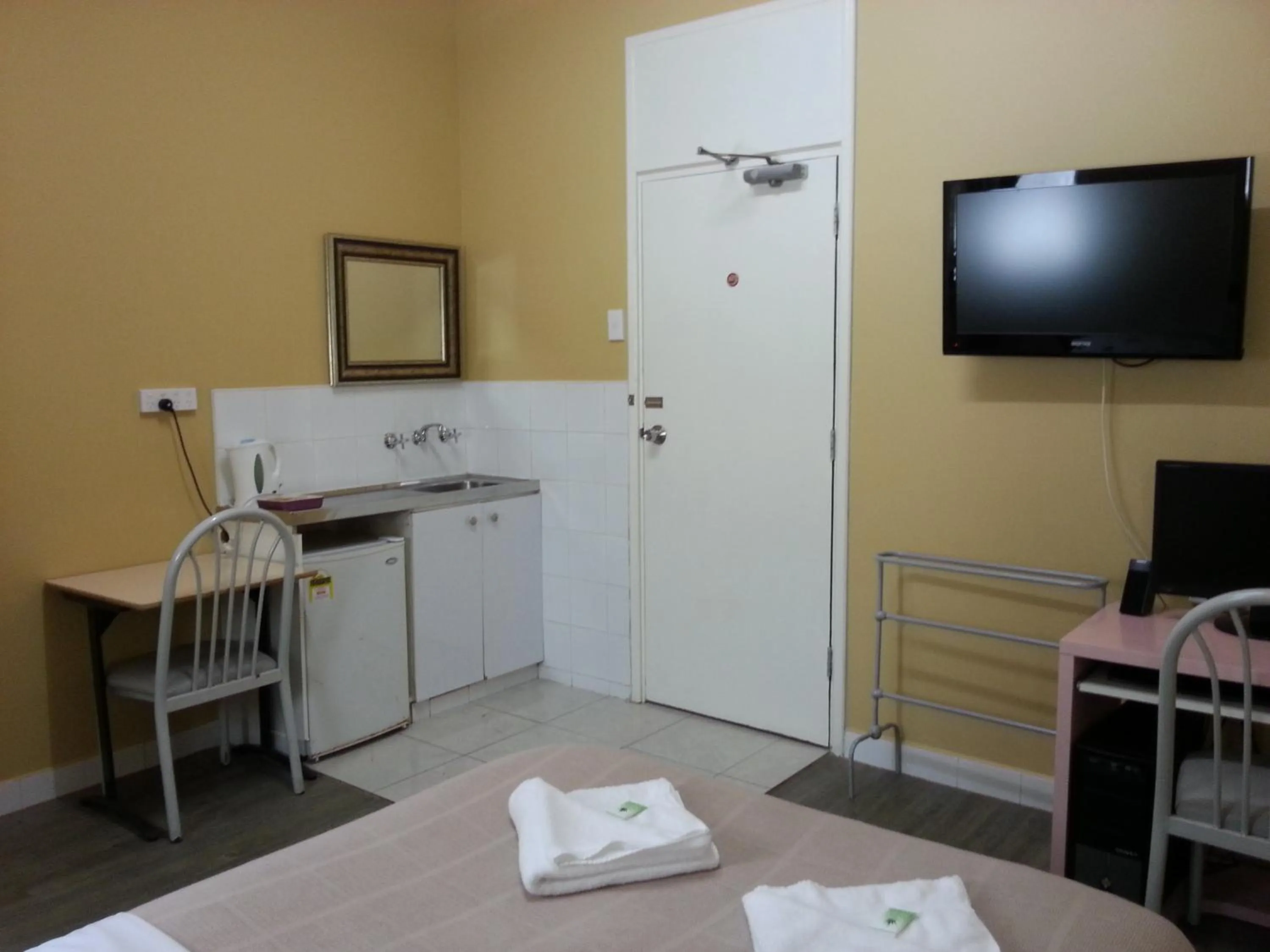 Photo of the whole room, Bed in Central Private Hotel