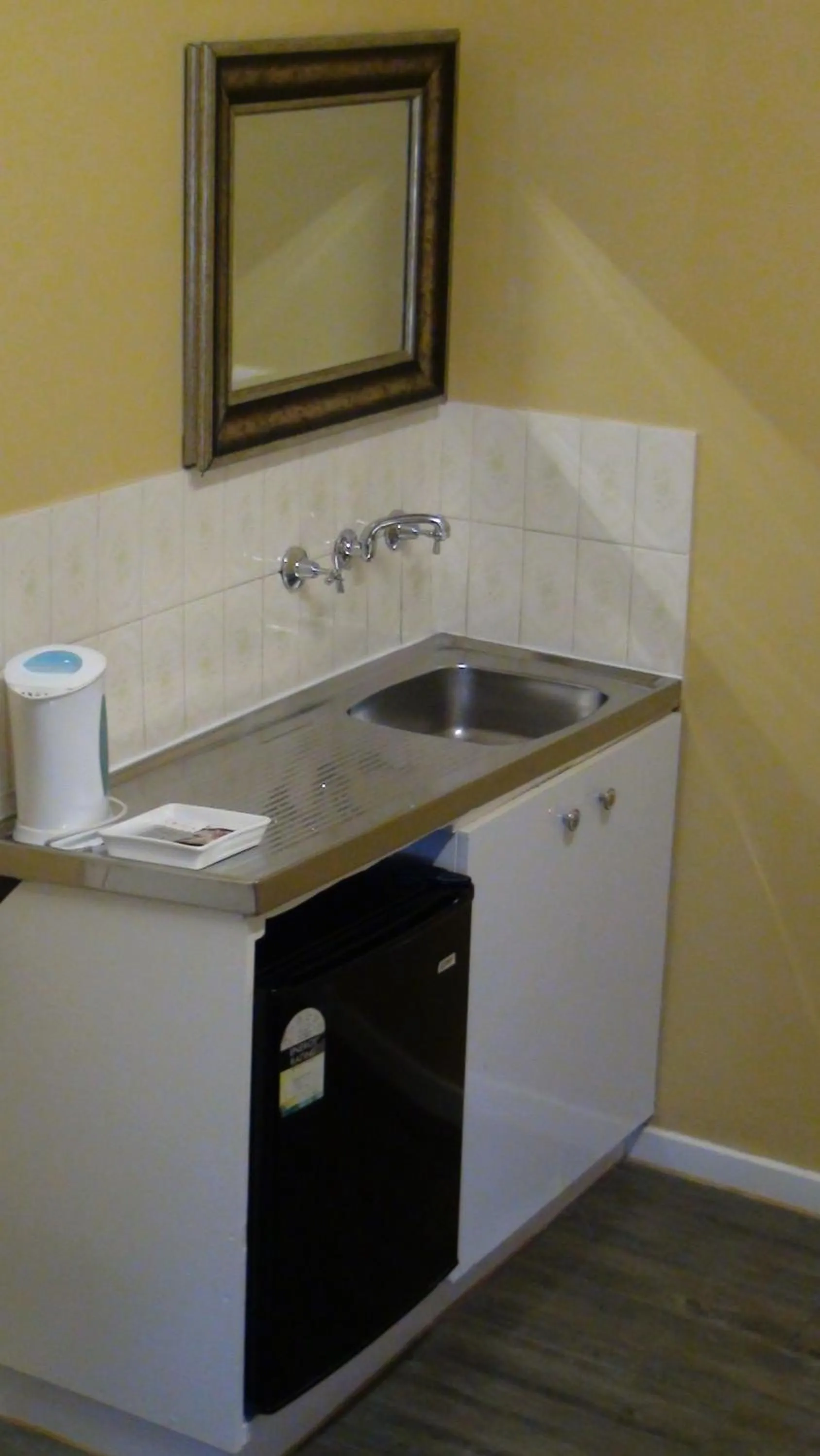 Kitchen or kitchenette in Central Private Hotel