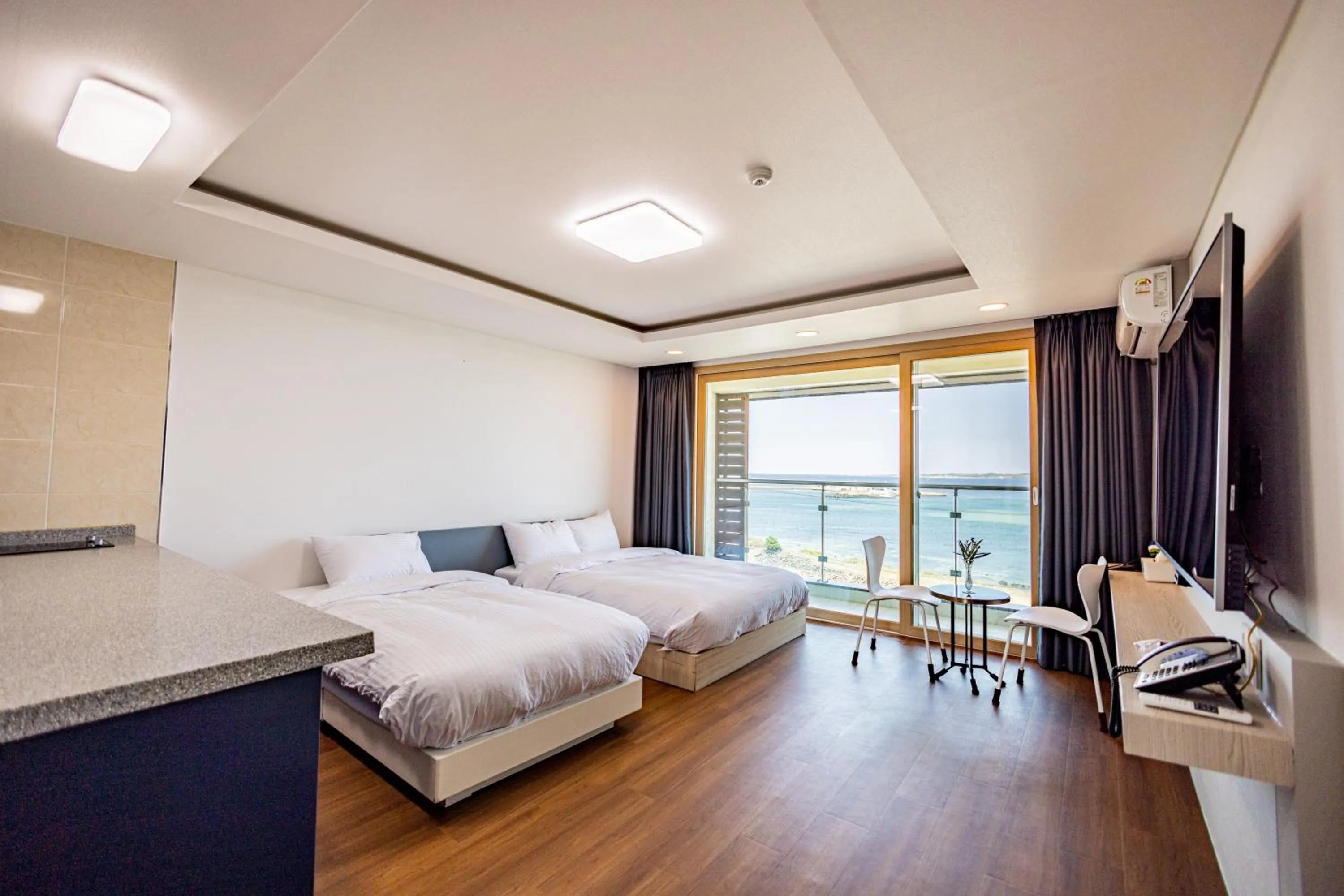 Bed in Jeju Arumdaun Resort